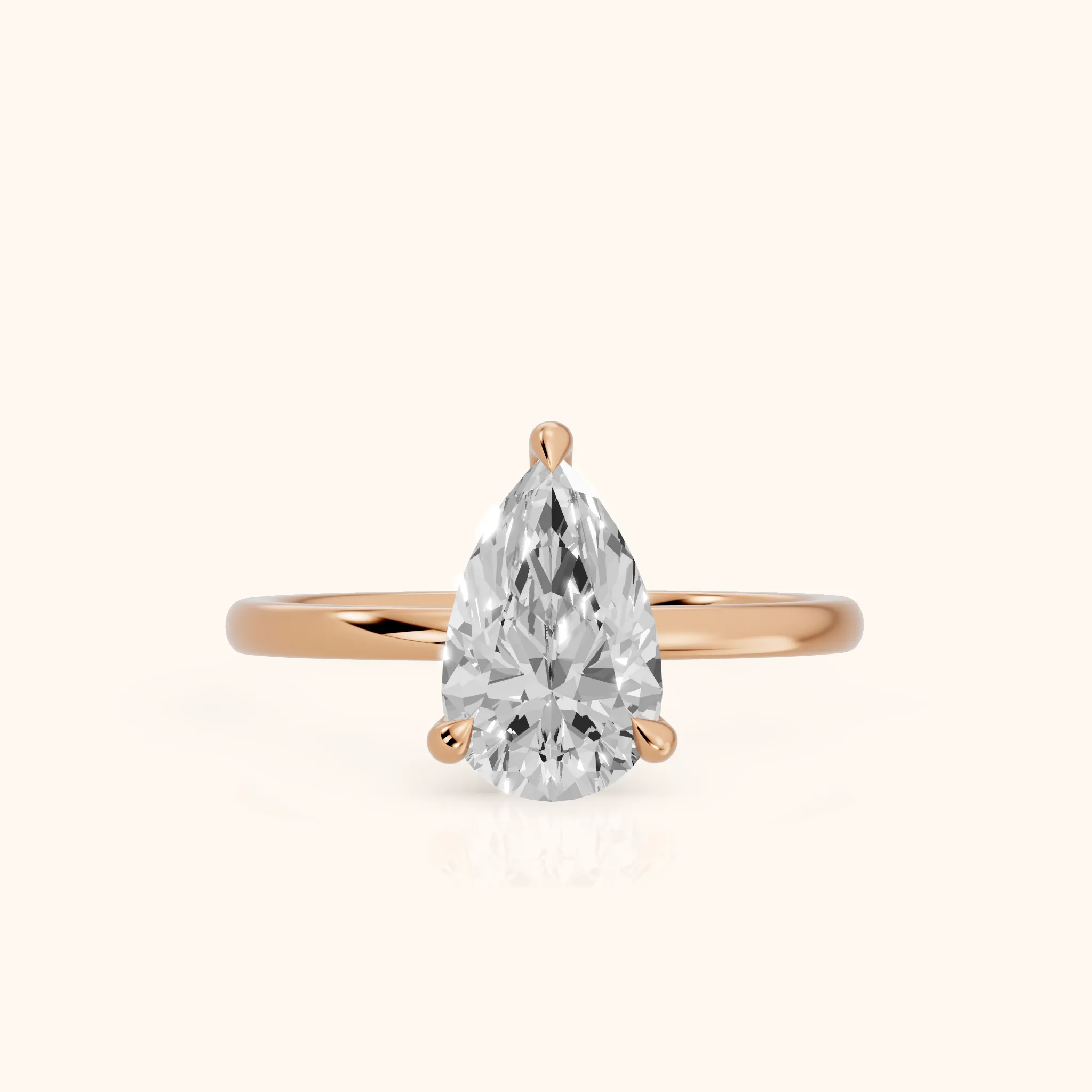 Nella Petite Solitaire Pear Diamond Engagement Ring in Rose Gold — view 1