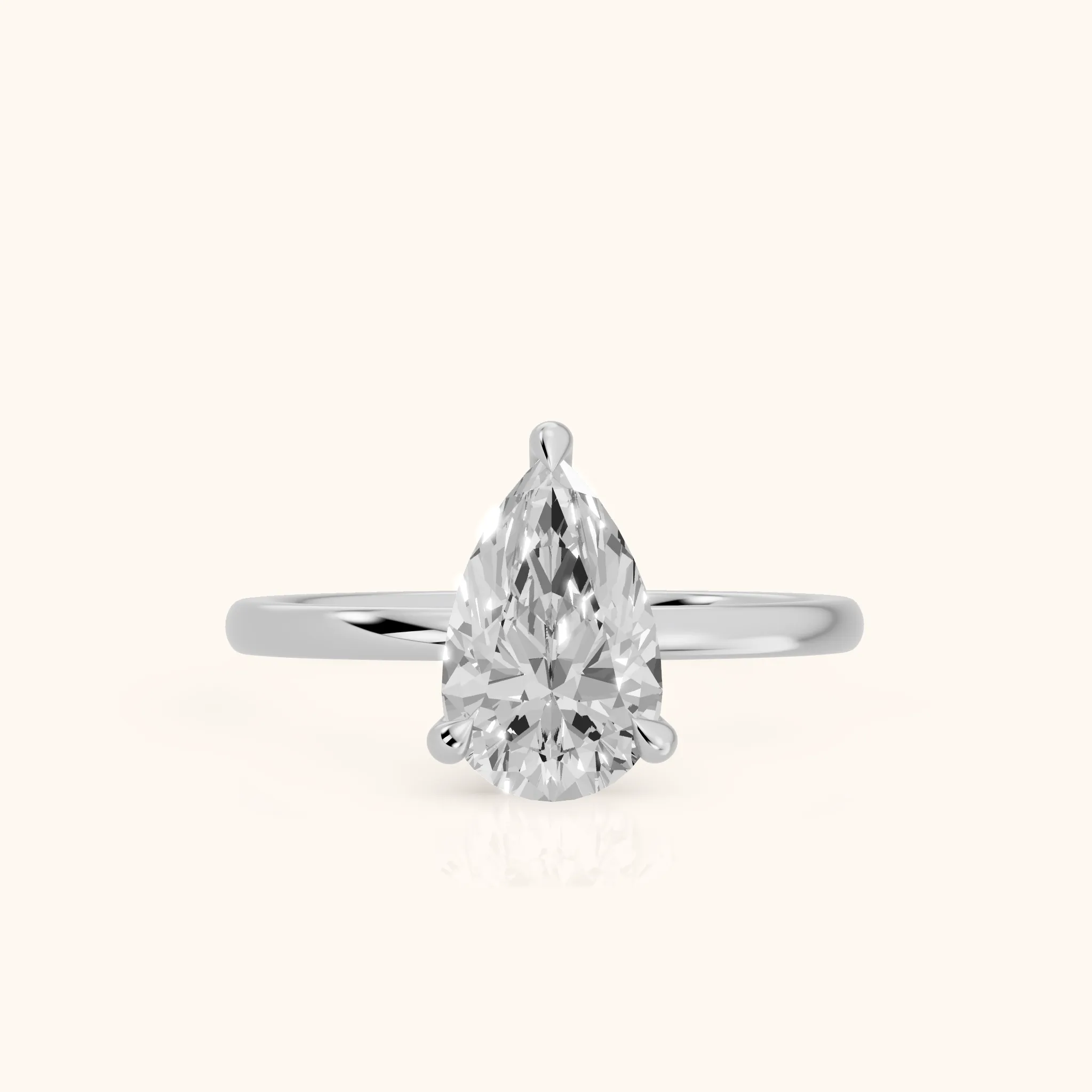 Nella Petite Solitaire Pear Diamond Engagement Ring in White Gold — view 1
