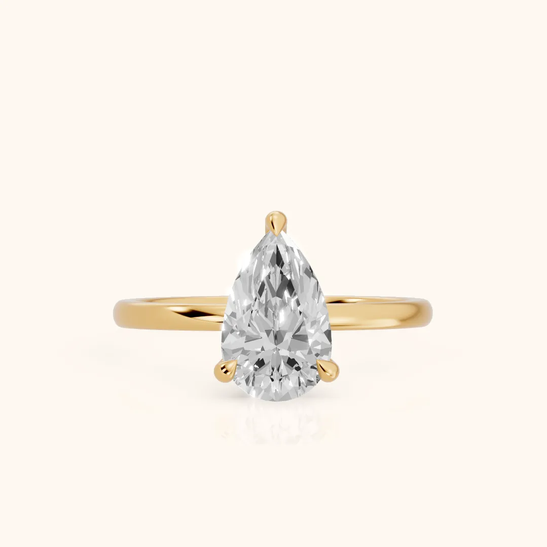 Nella Petite Solitaire Pear Diamond Engagement Ring in Yellow Gold — view 2
