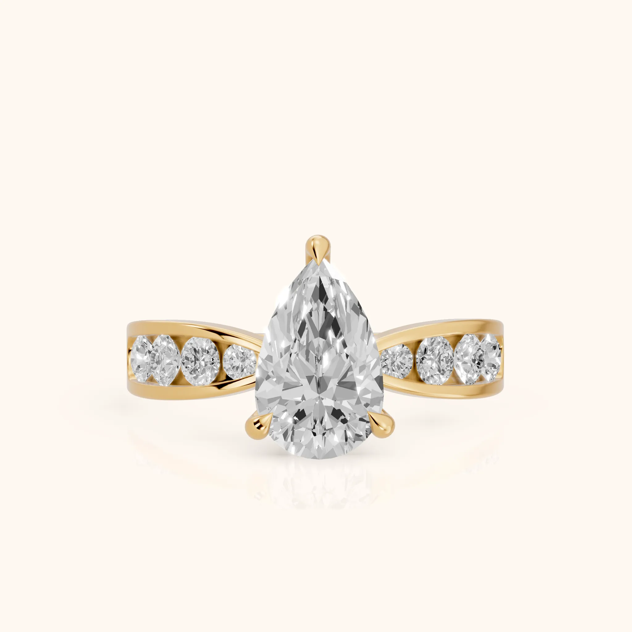 Noor Channel Set Sidestone Pear Diamond Engagement Ring in Yellow Gold — view 1