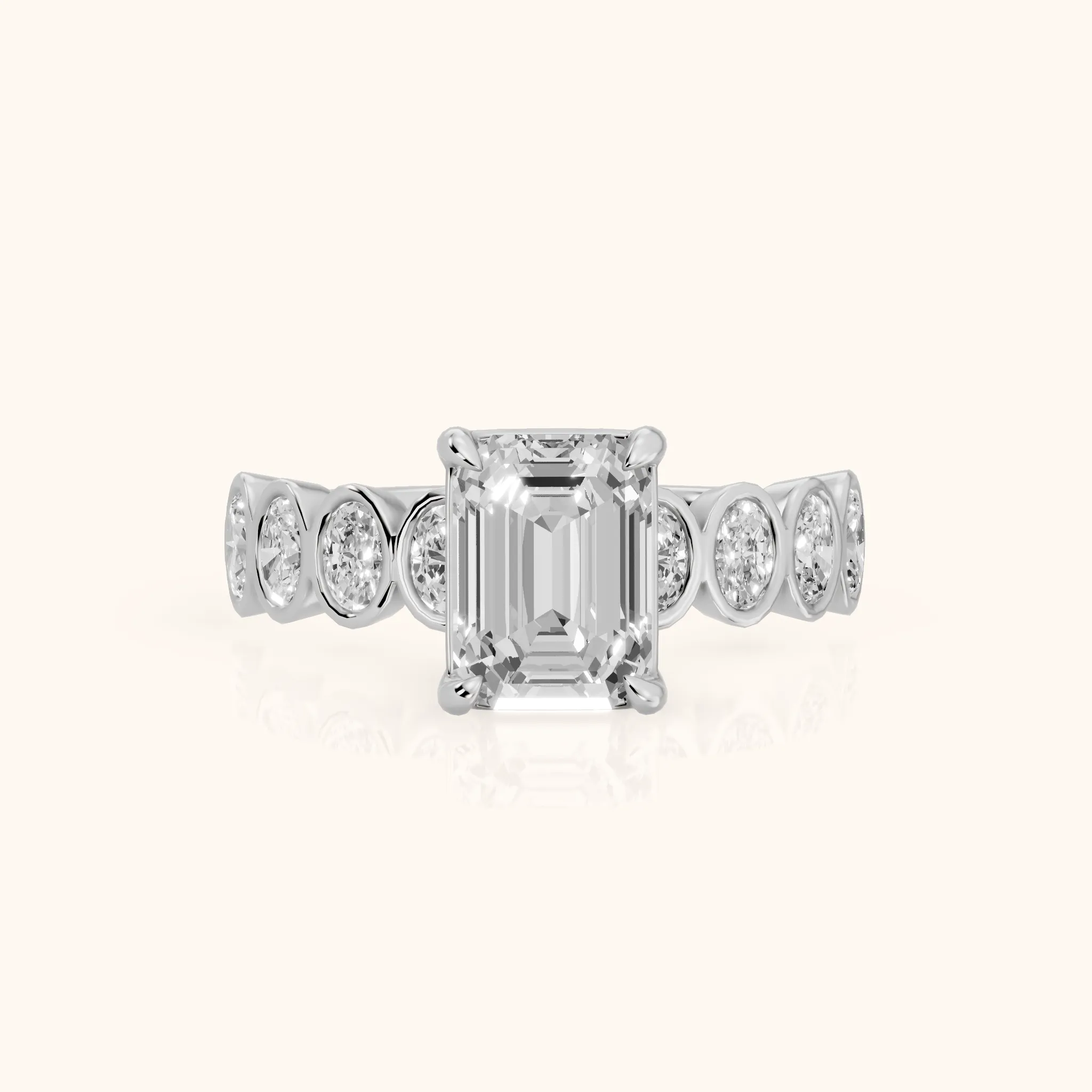 Vittoria Graduated Bezel Emerald Diamond Engagement Ring in Silver — view 1