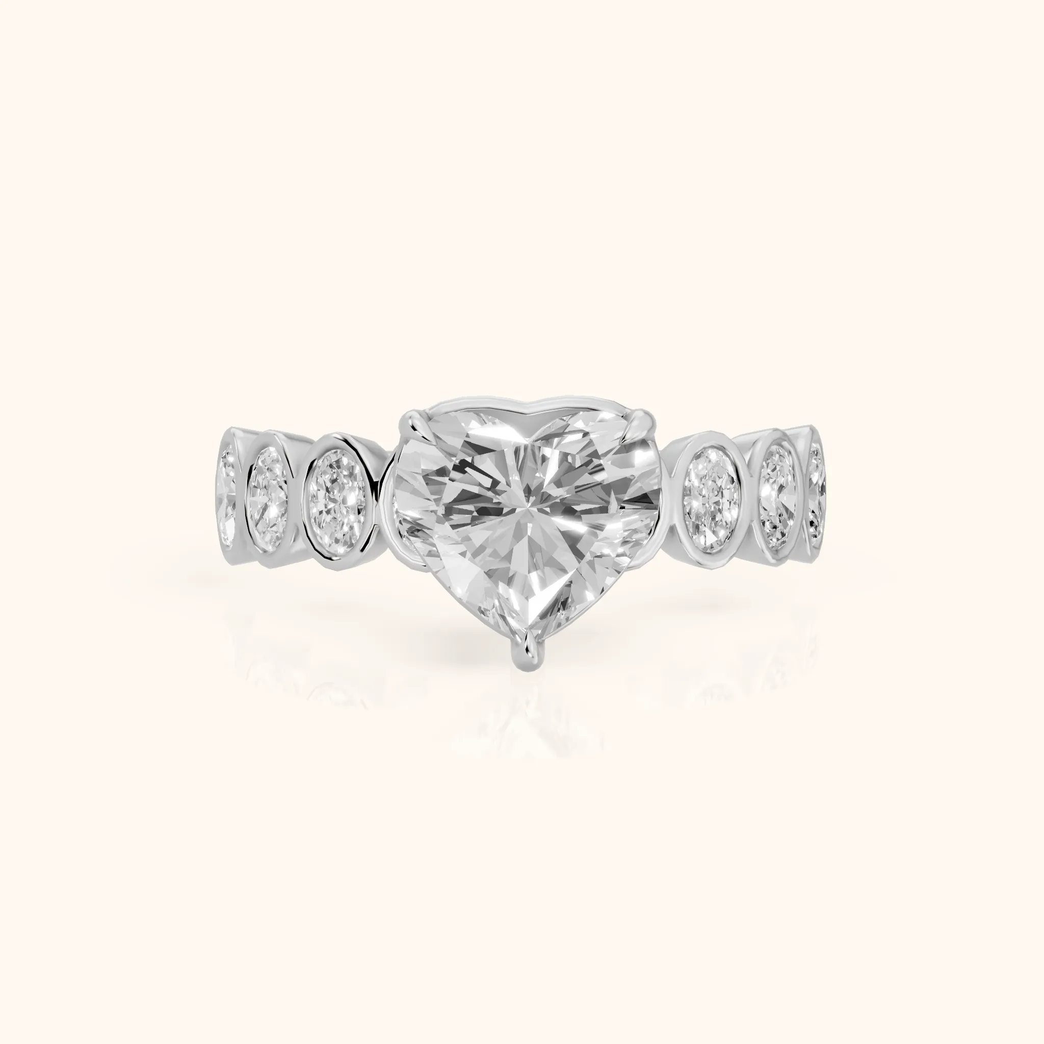 Vittoria Graduated Bezel Heart Diamond Engagement Ring in Silver — view 1