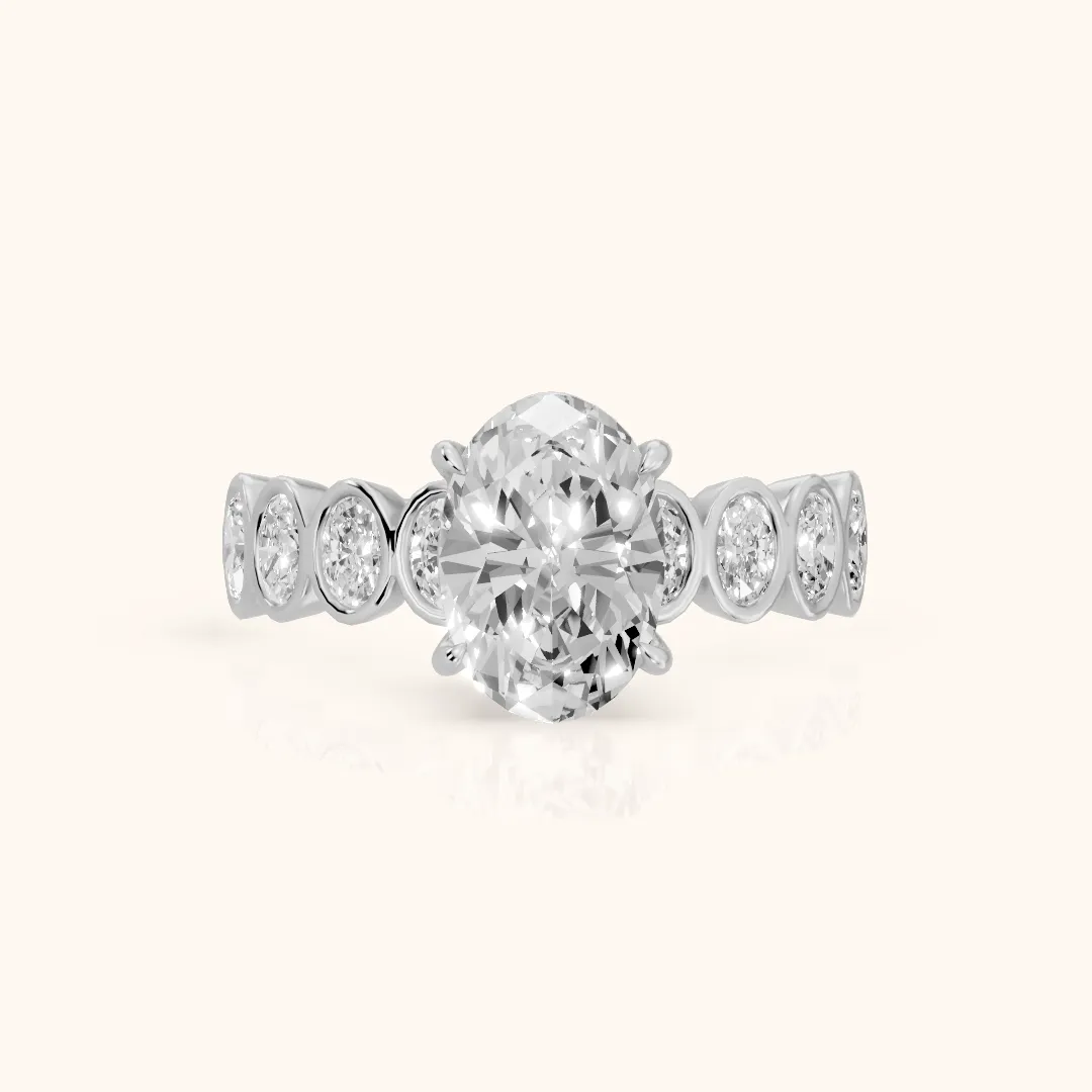 Vittoria Graduated Bezel Oval Diamond Engagement Ring in Silver — view 2