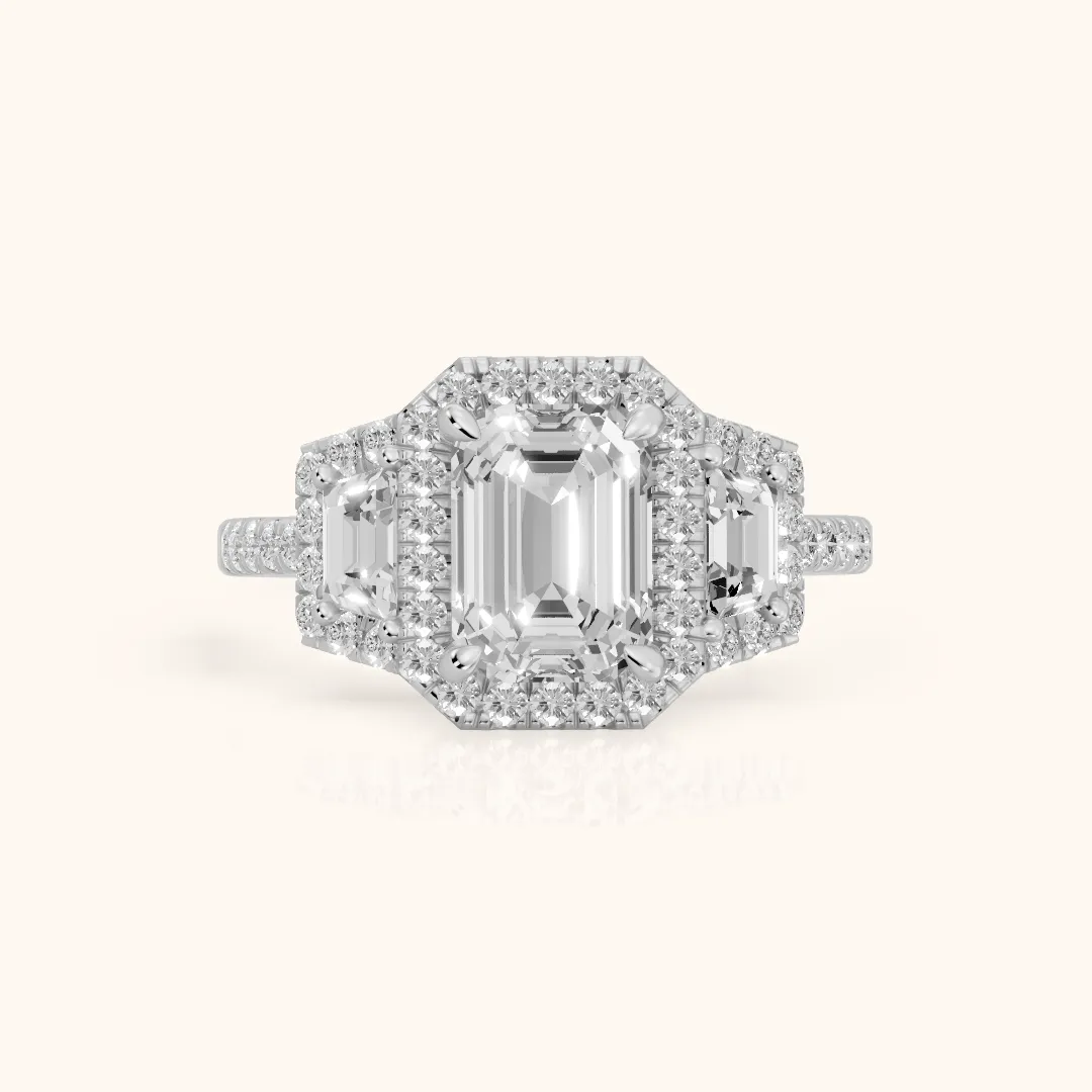 Paulina Three-Stone Halo Emerald Diamond Engagement Ring in Silver — view 2