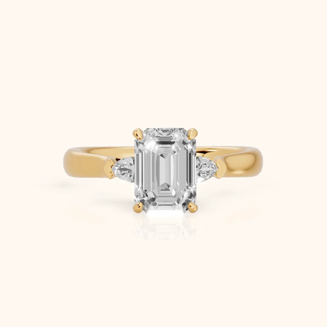 Dahlia Three-Stone Cathedral Emerald Diamond Engagement Ring in Yellow Gold — view 2