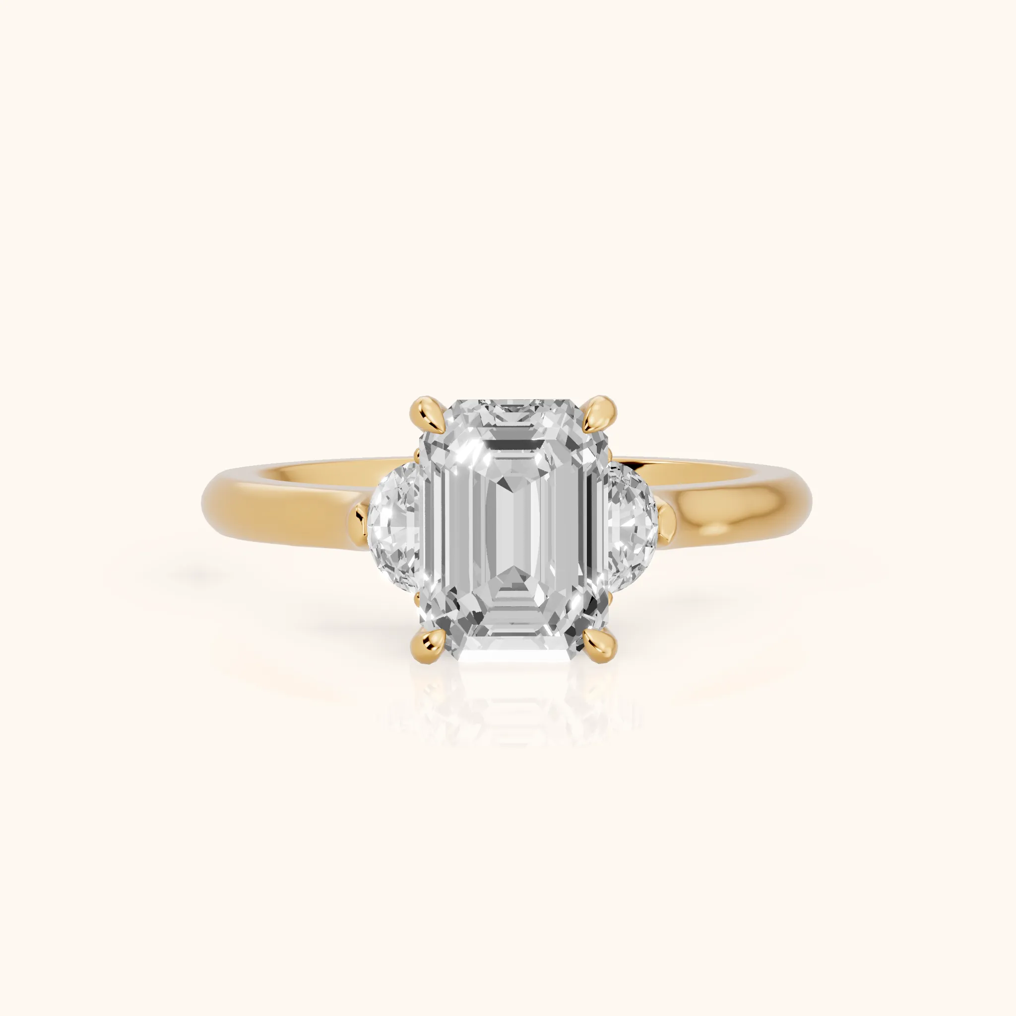 Hilary Half-Moon Three-Stone Emerald Diamond Engagement Ring in Yellow Gold — view 1