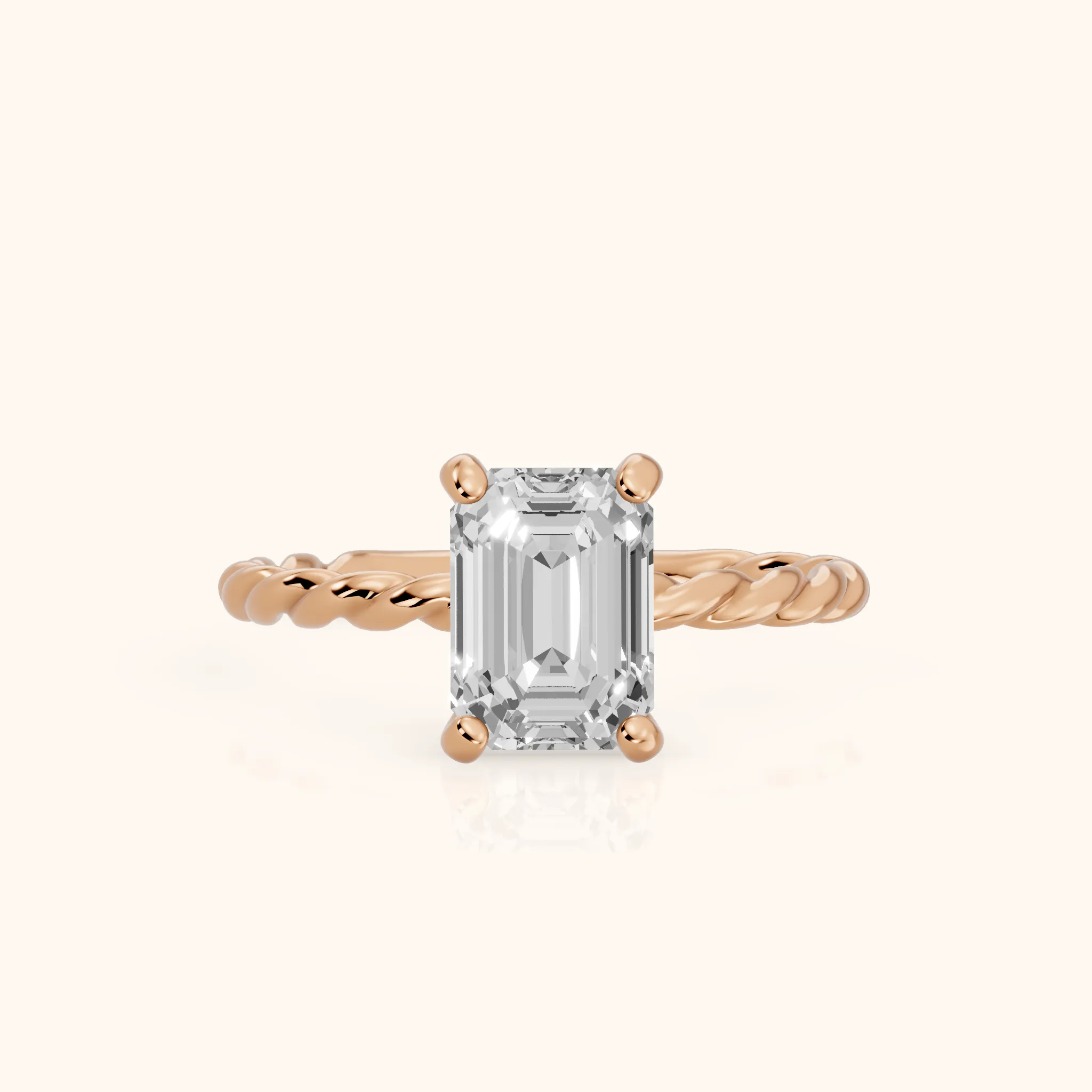 Robyn Twist Solitaire Emerald Diamond Engagement Ring in Rose Gold — view 1