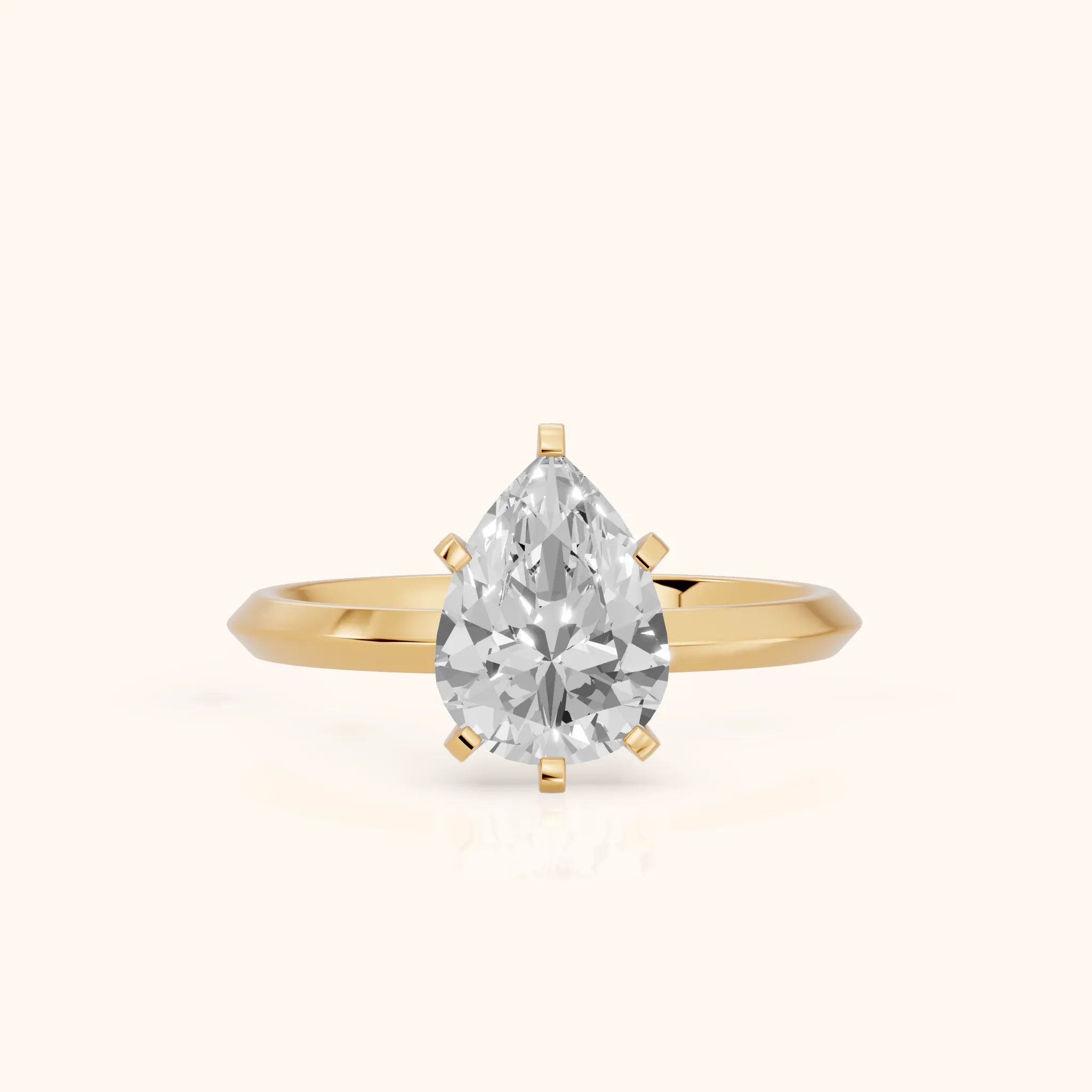 Verity Solitaire Knife Edge Pear Diamond Engagement Ring in Yellow Gold — view 1
