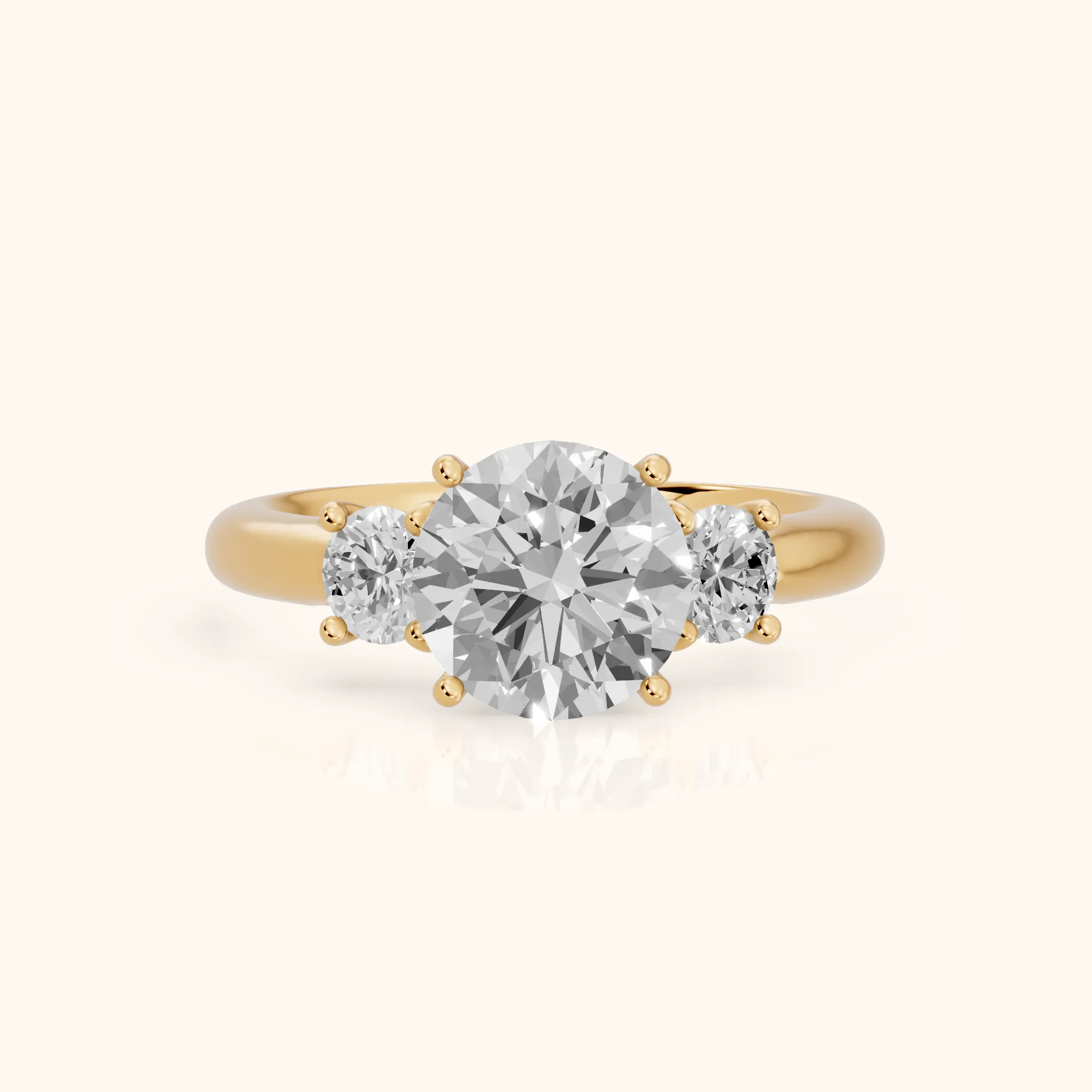 Zara Three-Stone Round Diamond Engagement Ring in Yellow Gold — view 1