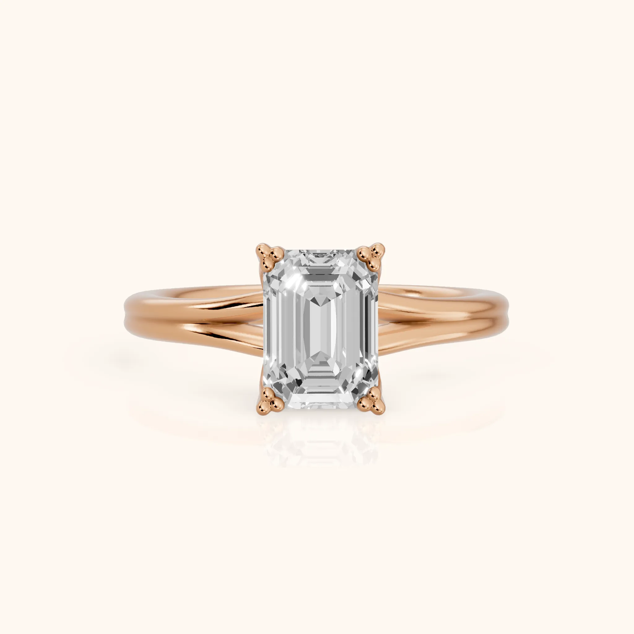 Neve Solitaire Split Shank Emerald Diamond Engagement Ring in Rose Gold — view 1