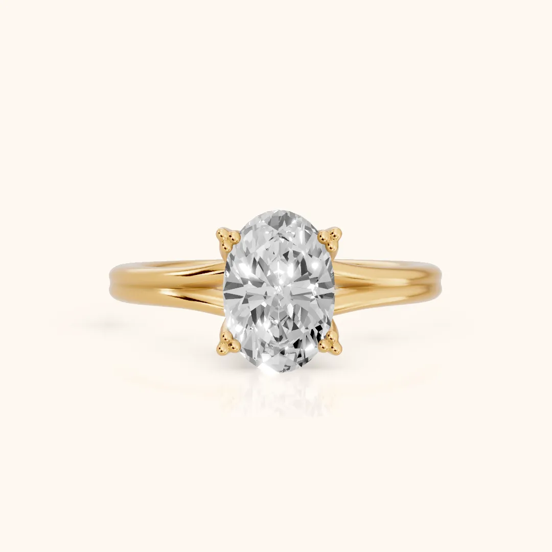 Neve Solitaire Split Shank Oval Diamond Engagement Ring in Yellow Gold — view 2