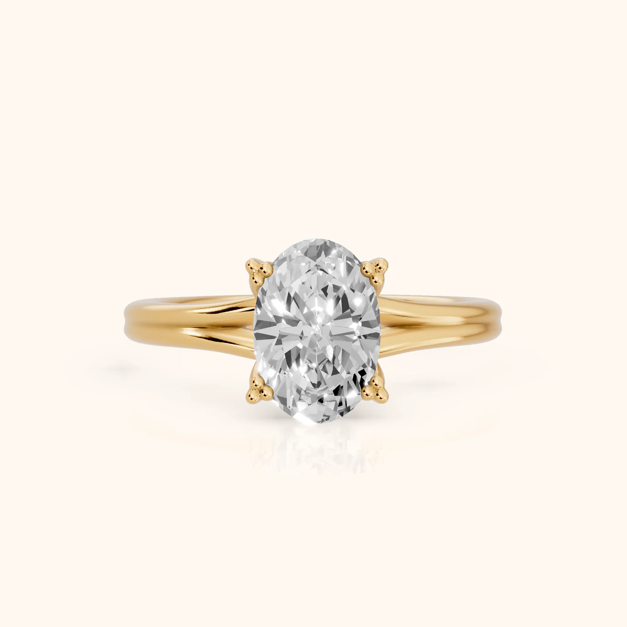 Neve Solitaire Split Shank Oval Diamond Engagement Ring in Yellow Gold — view 1