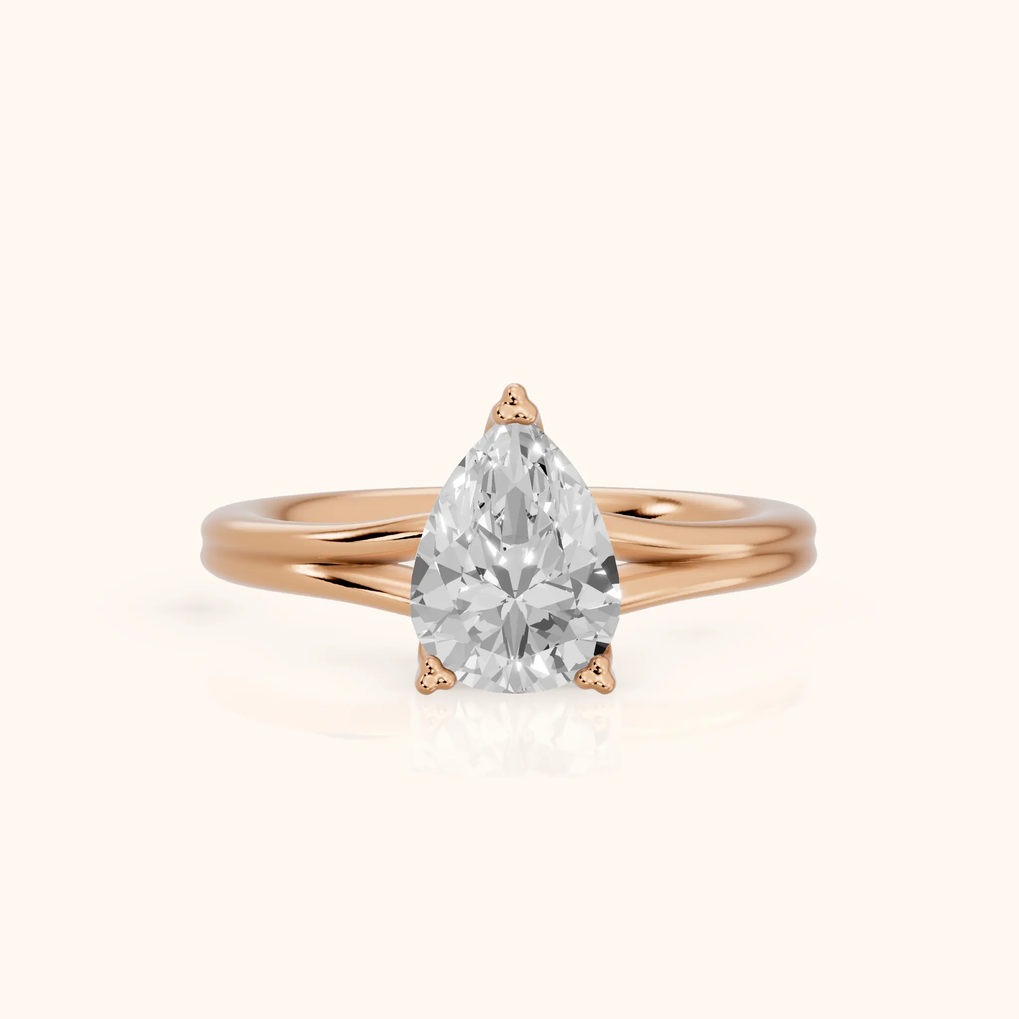 Neve Solitaire Split Shank Pear Diamond Engagement Ring in Rose Gold — view 1
