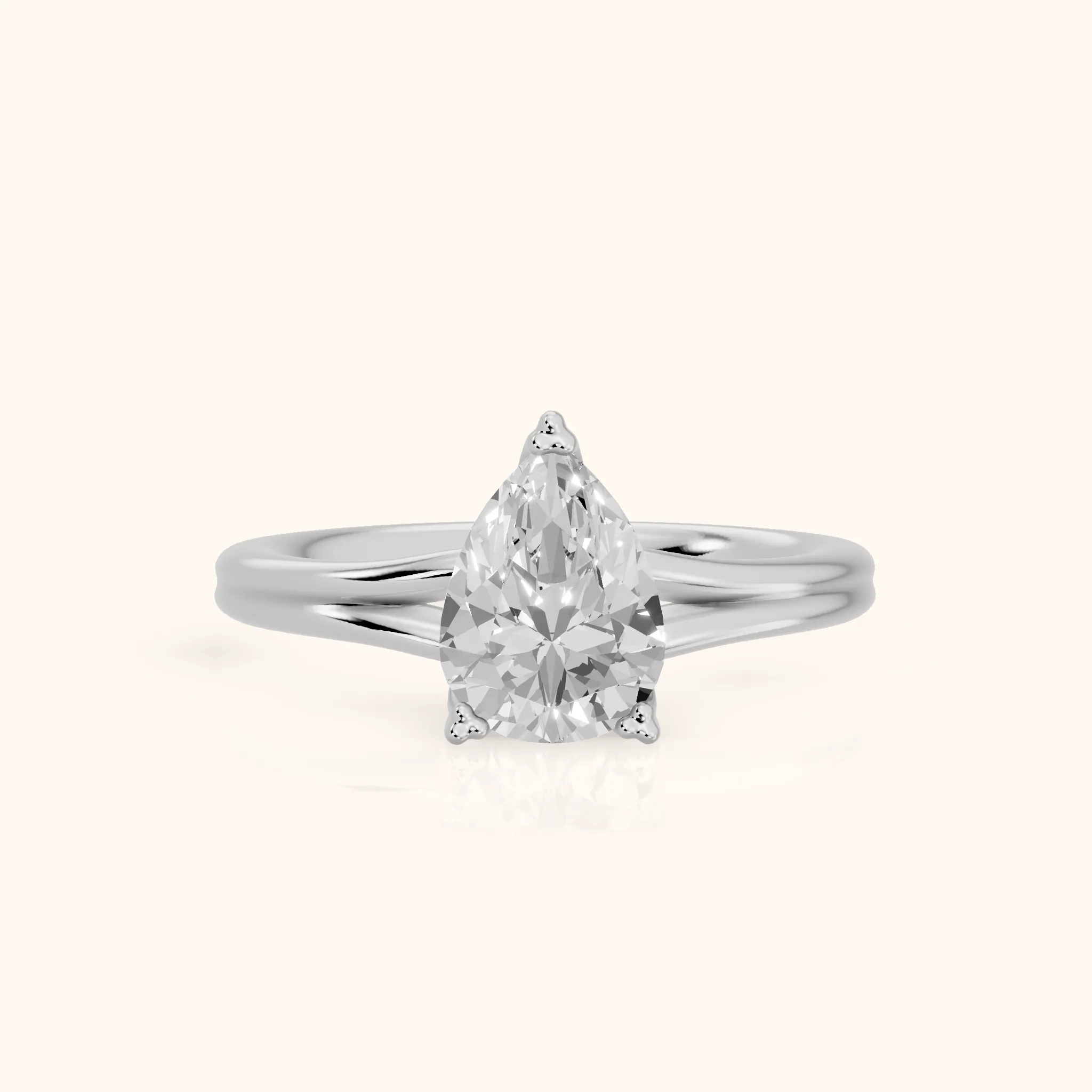 Neve Solitaire Split Shank Pear Diamond Engagement Ring in Silver — view 1