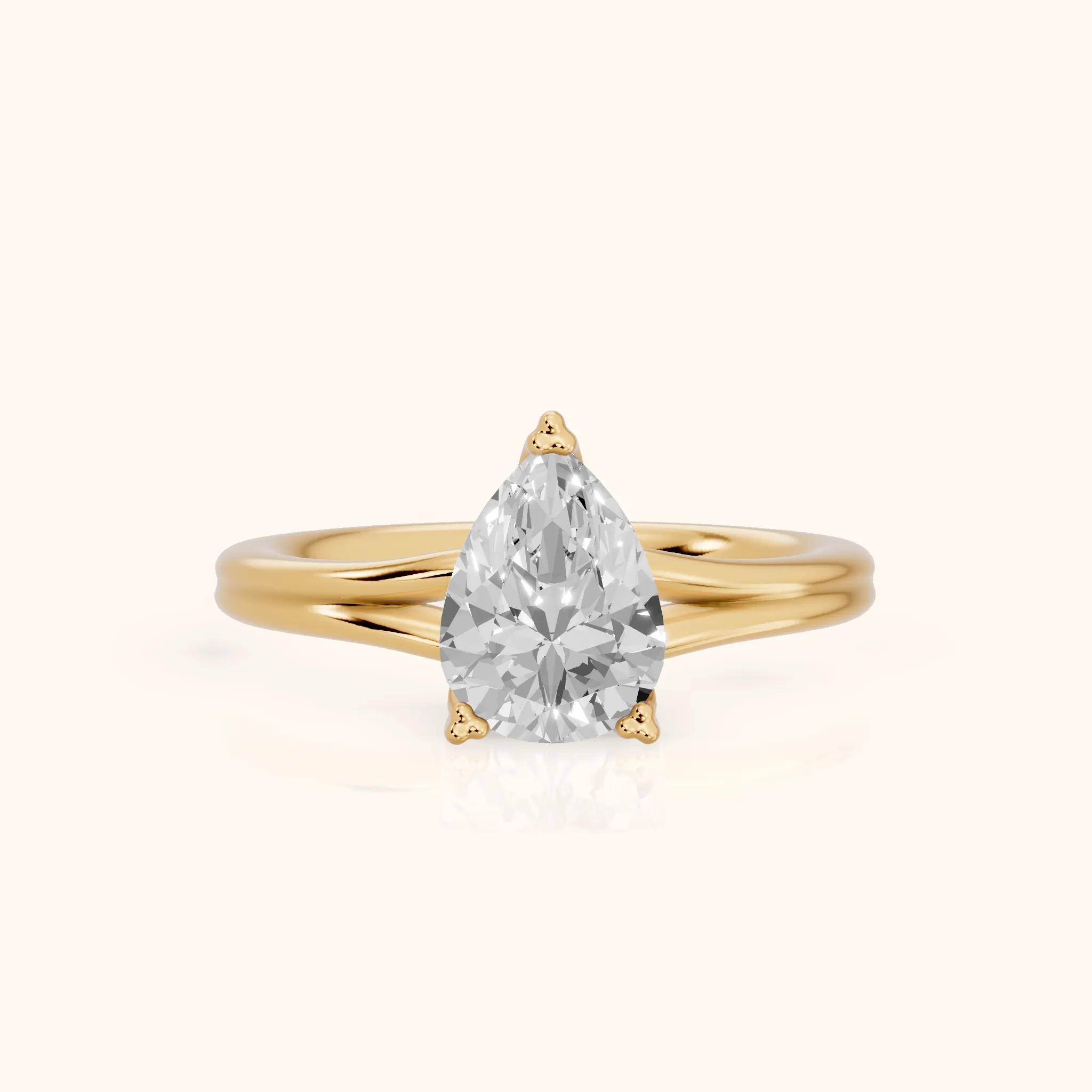Neve Solitaire Split Shank Pear Diamond Engagement Ring in Yellow Gold — view 1
