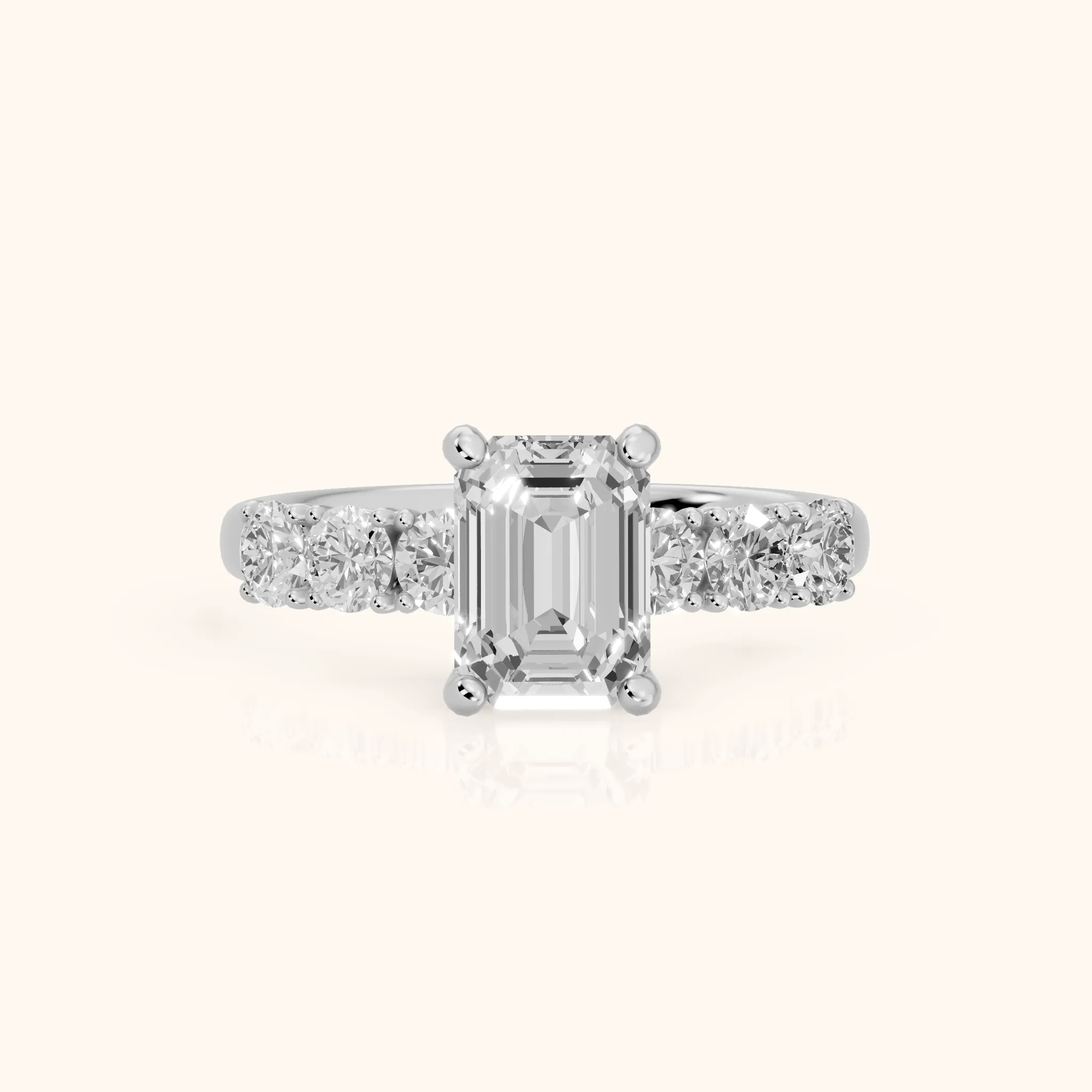 Sorrel Graduated Seven-Stone Emerald Diamond Engagement Ring in White Gold — view 1
