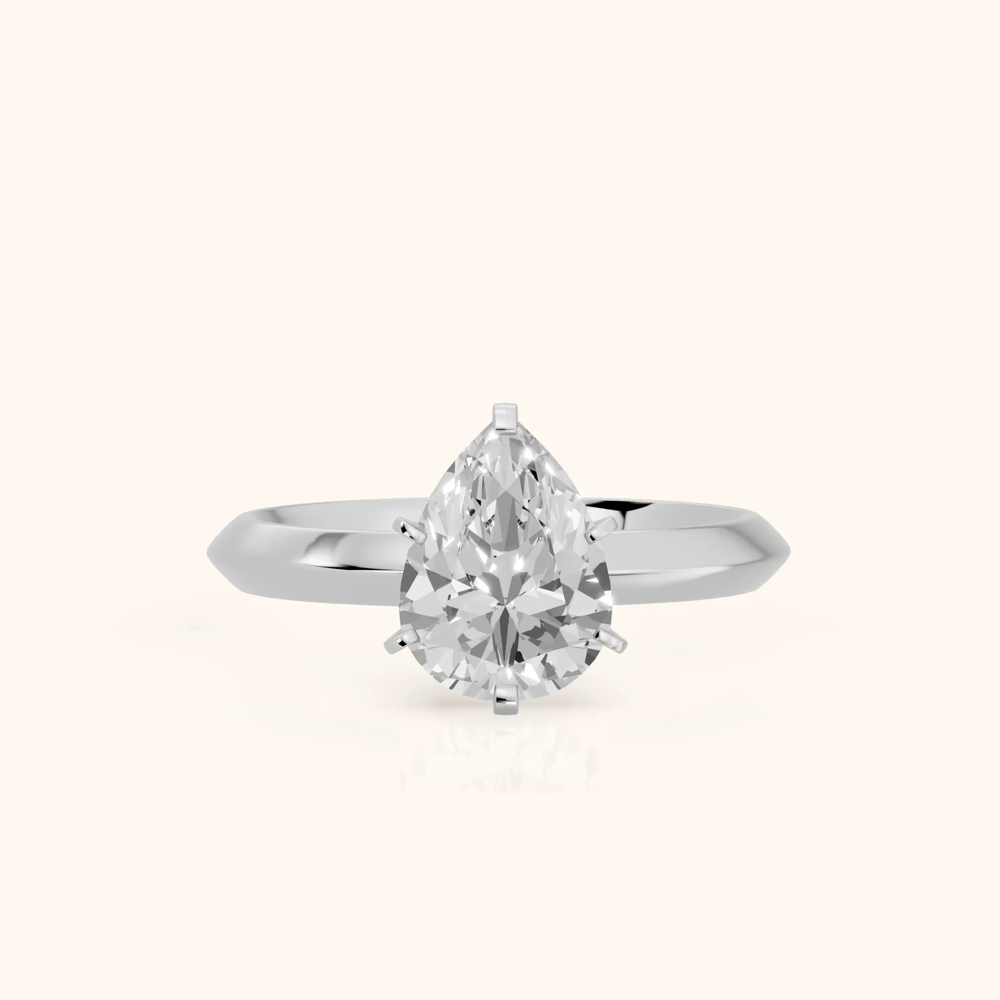 Hailey Solitaire Knife Edge Pear Diamond Engagement Ring in White Gold — view 1