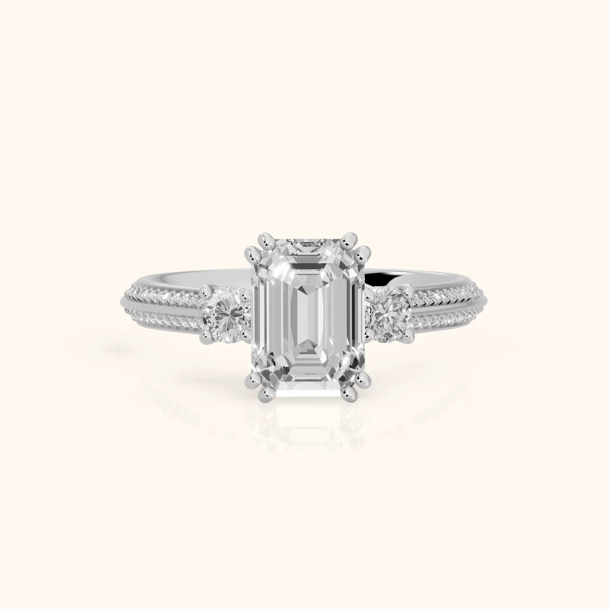 Aspen Three-Stone Knife Edge Emerald Diamond Engagement Ring in Platinum — view 1