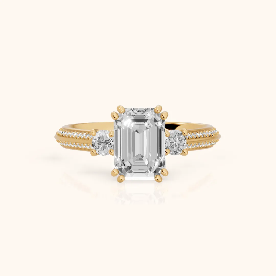 Aspen Three-Stone Knife Edge Emerald Diamond Engagement Ring in Yellow Gold — view 2