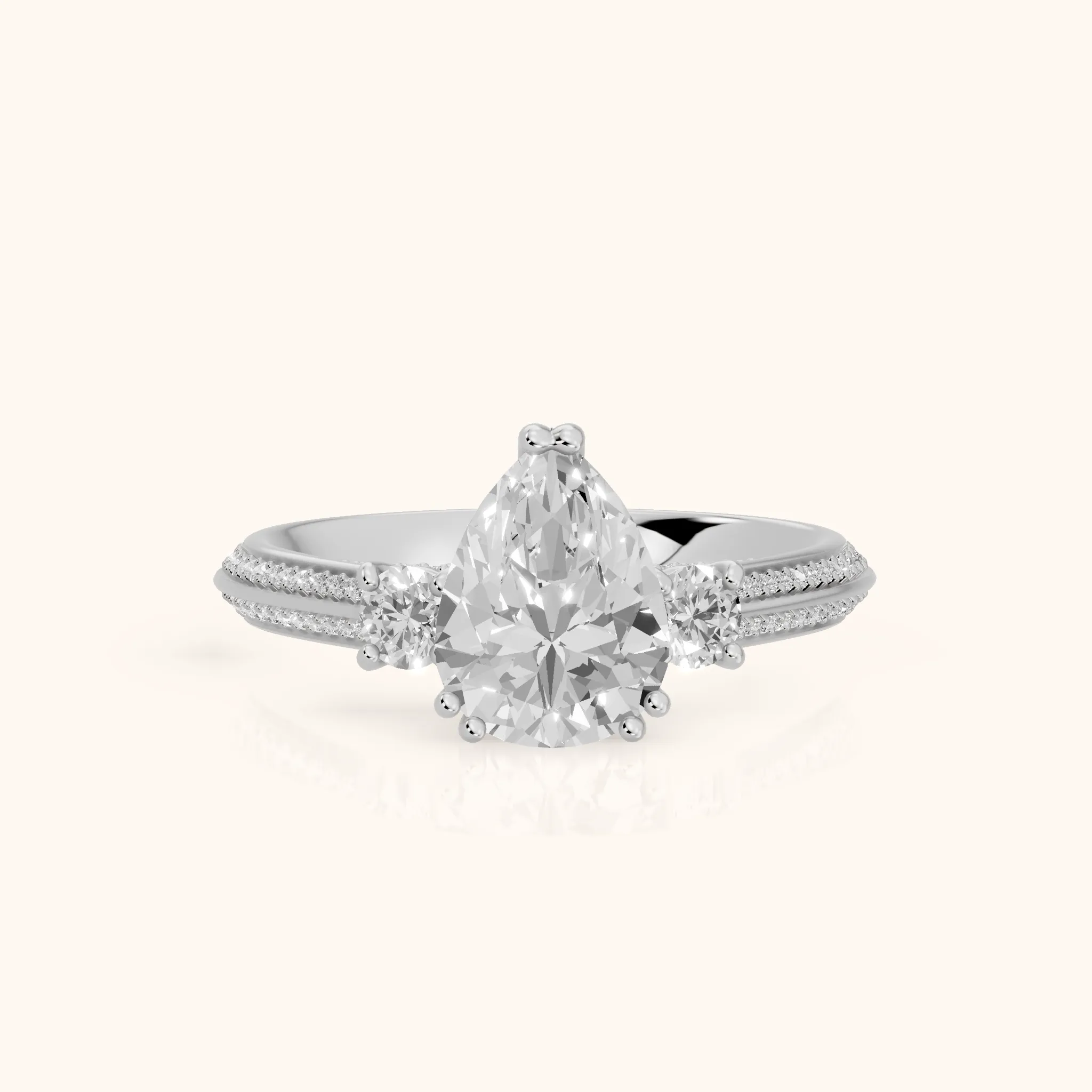 Aspen Three-Stone Knife Edge Pear Diamond Engagement Ring in Platinum — view 1