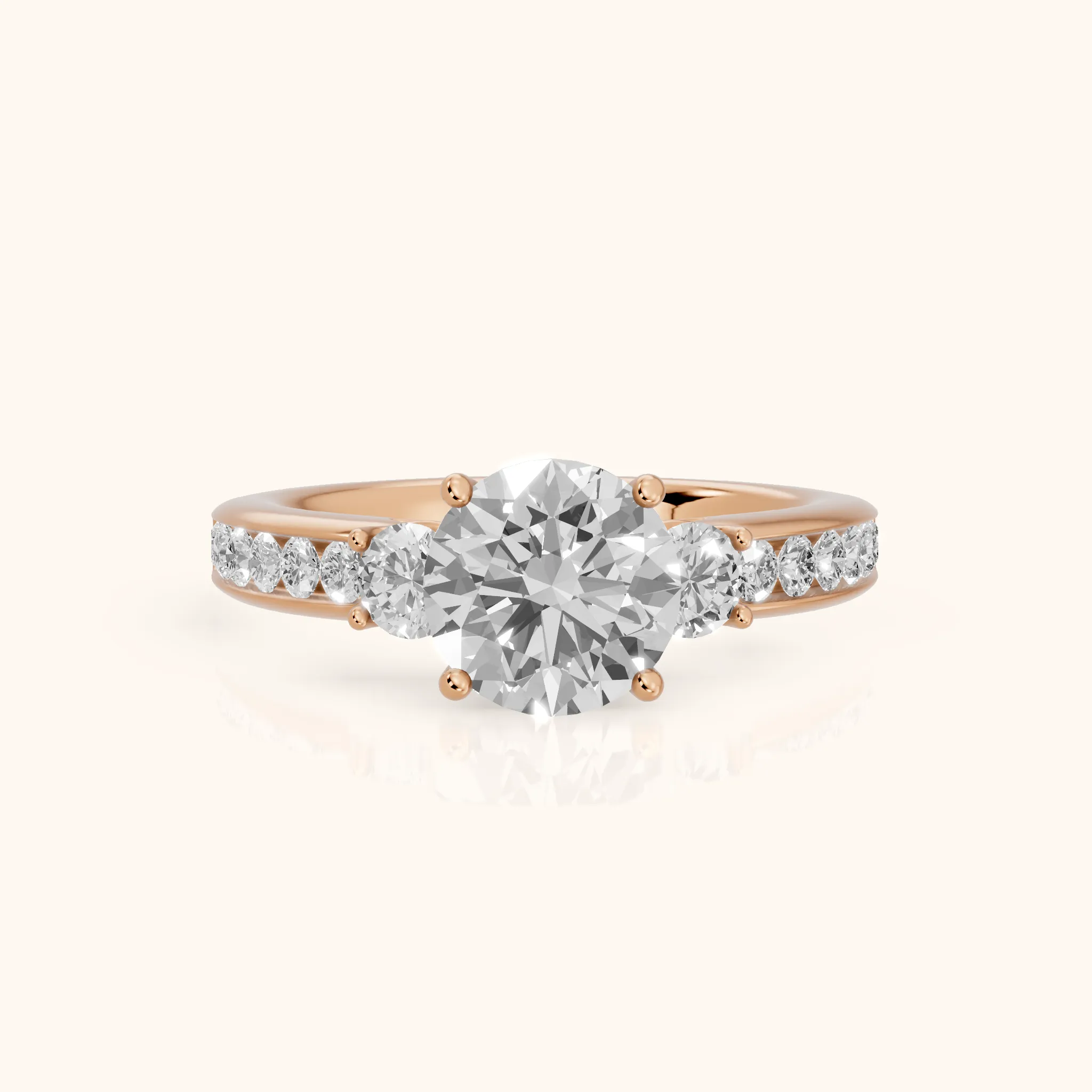 Bluebell Three-Stone Channel Set Round Diamond Engagement Ring in Rose Gold — view 1