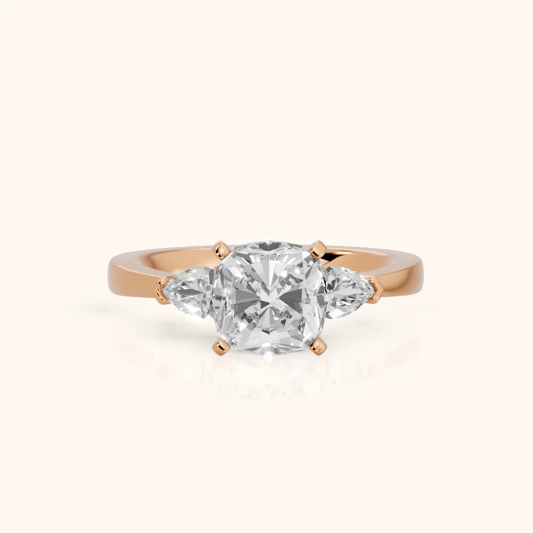 Amabel Three-Stone Cushion Diamond Engagement Ring in Rose Gold — view 2