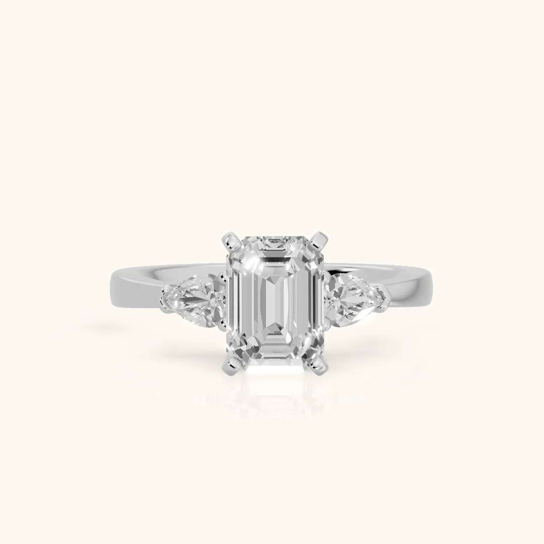 Amabel Three-Stone Emerald Diamond Engagement Ring in Platinum — view 2