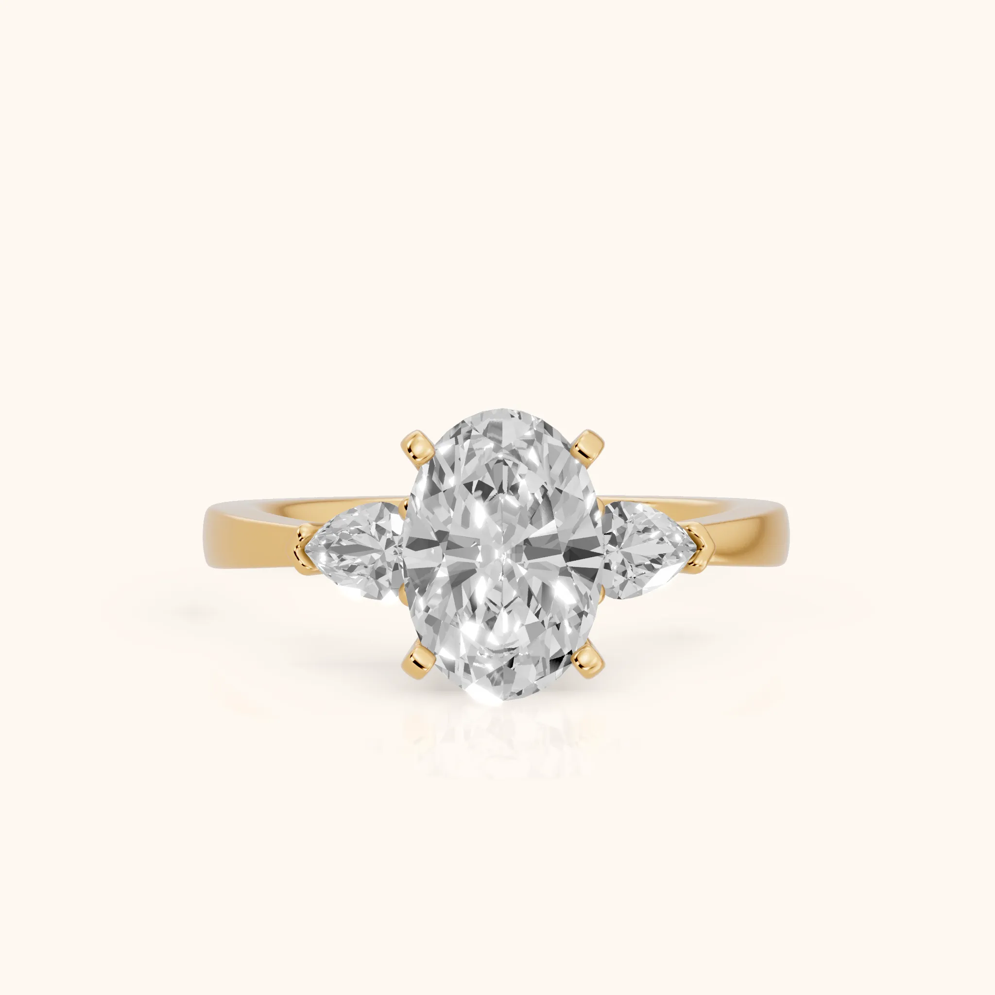 Amabel Three-Stone Oval Diamond Engagement Ring in Yellow Gold — view 1