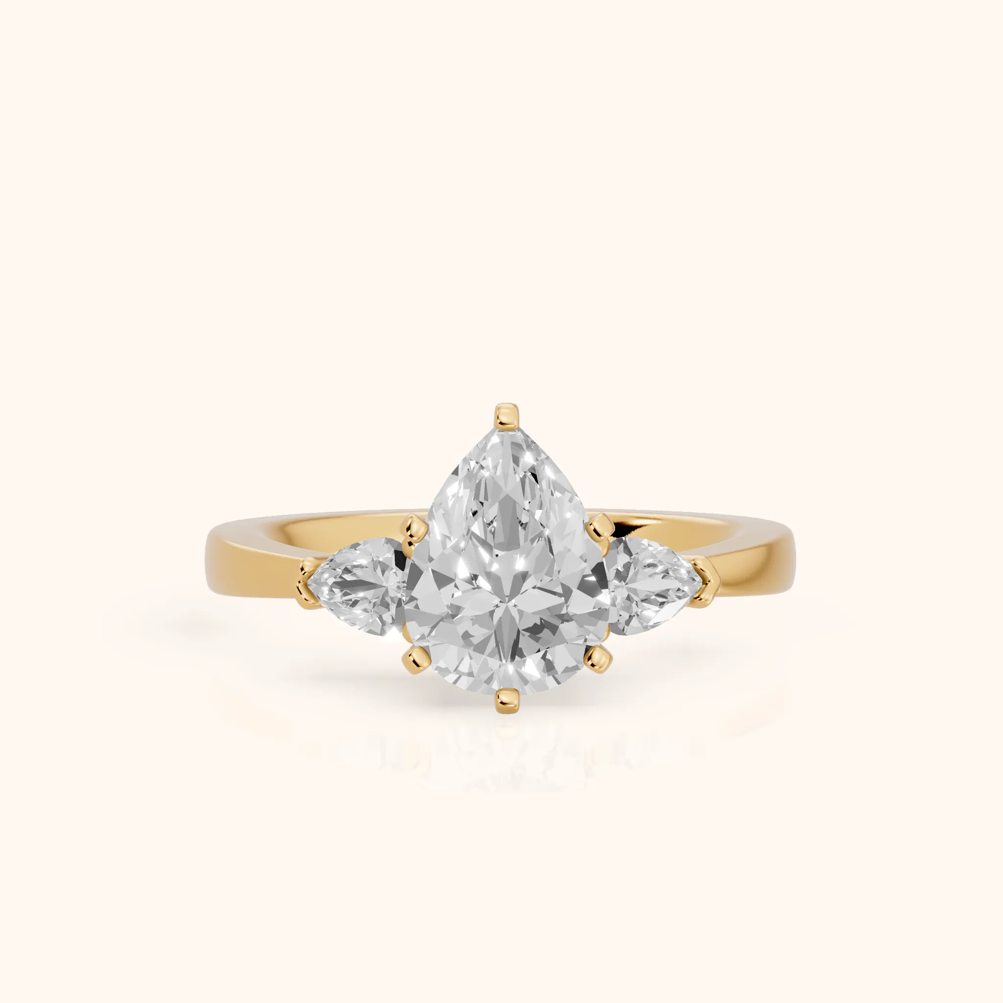 Amabel Three-Stone Pear Diamond Engagement Ring in Yellow Gold — view 1