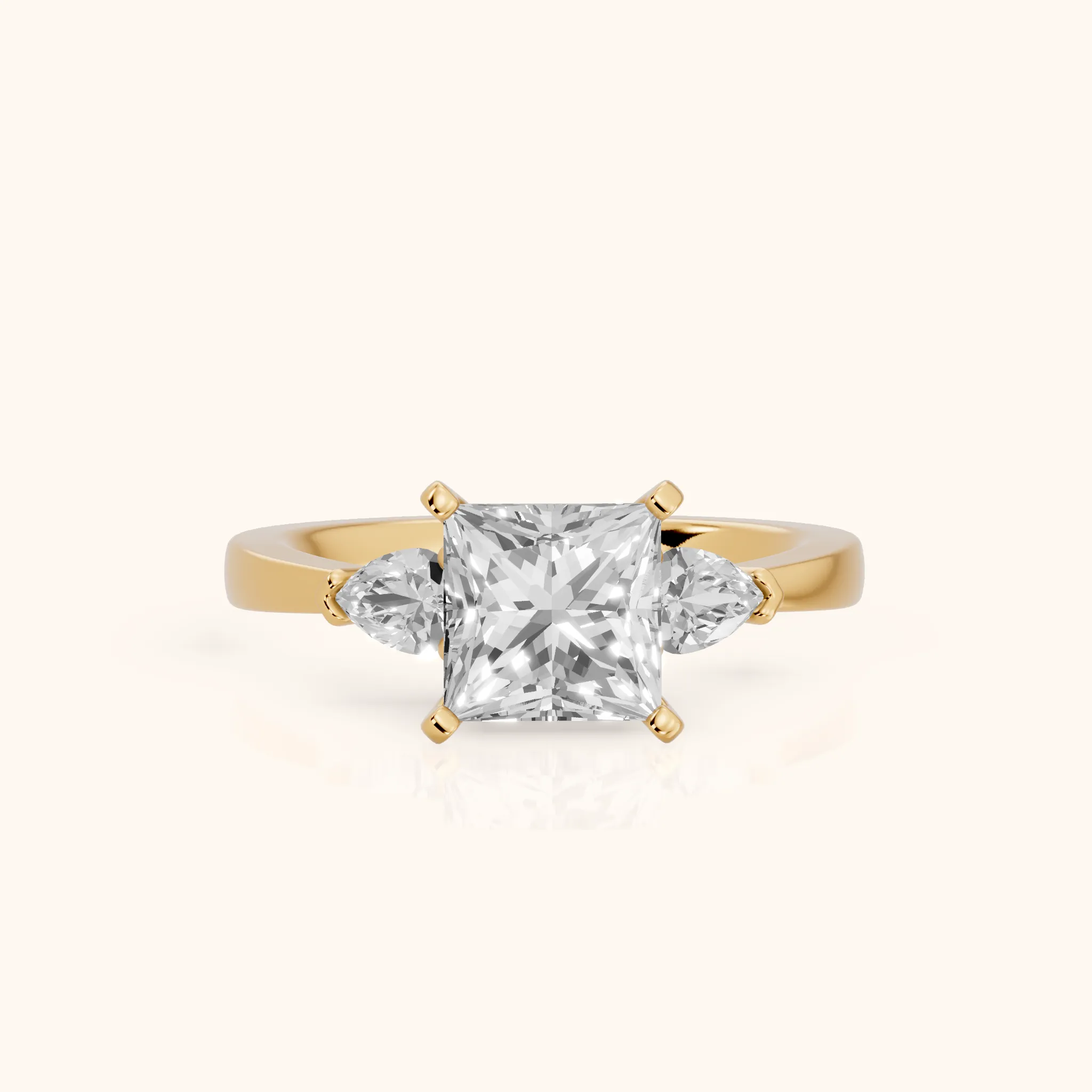 Amabel Three-Stone Princess Diamond Engagement Ring in Yellow Gold — view 1