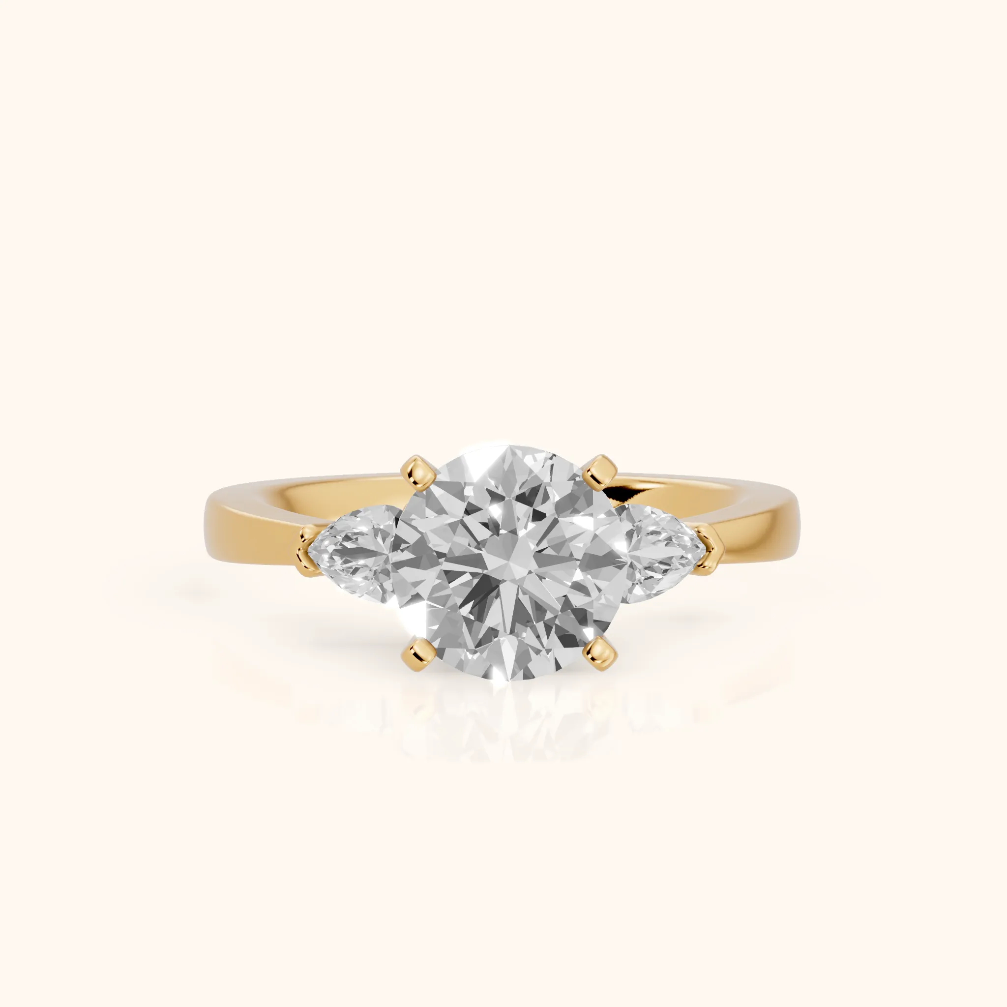 Amabel Three-Stone Round Diamond Engagement Ring in Yellow Gold — view 1