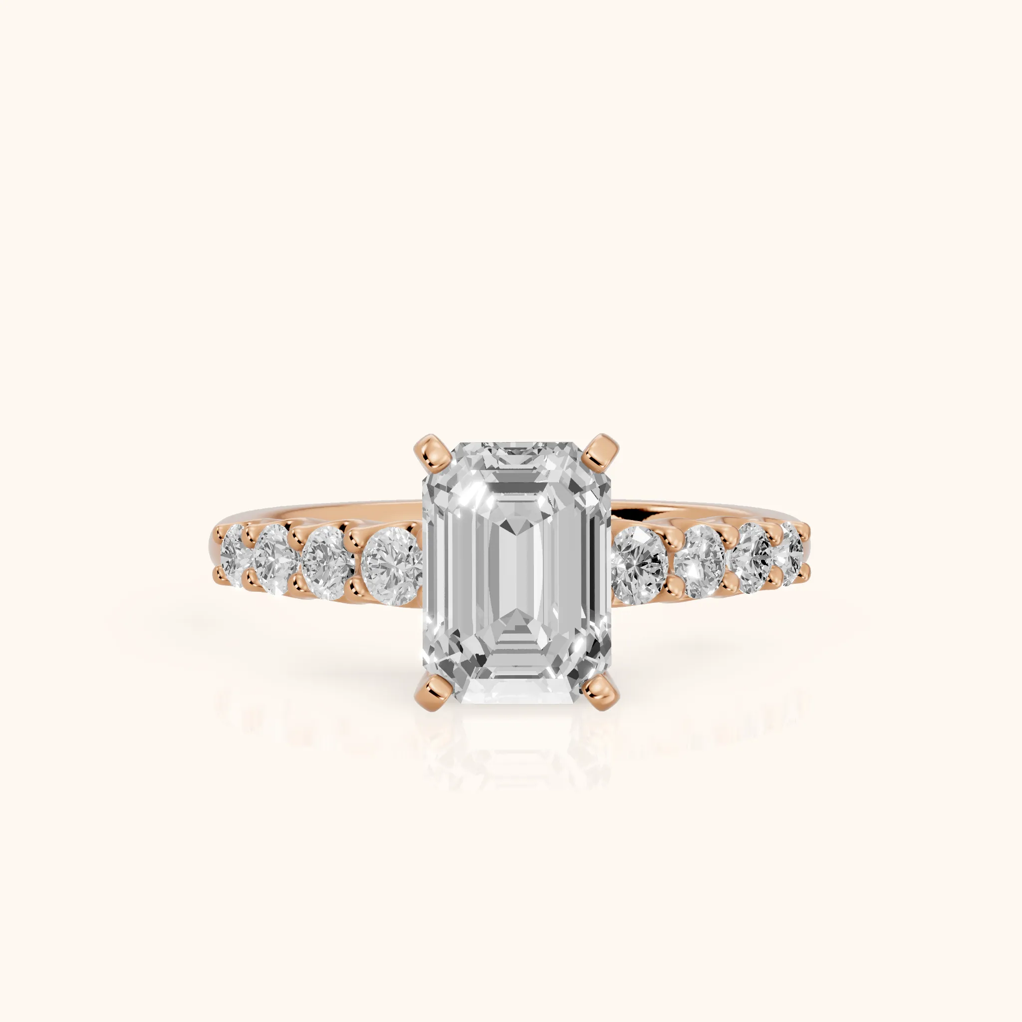 Augusta Graduated Pavé Emerald Diamond Engagement Ring in Rose Gold — view 1