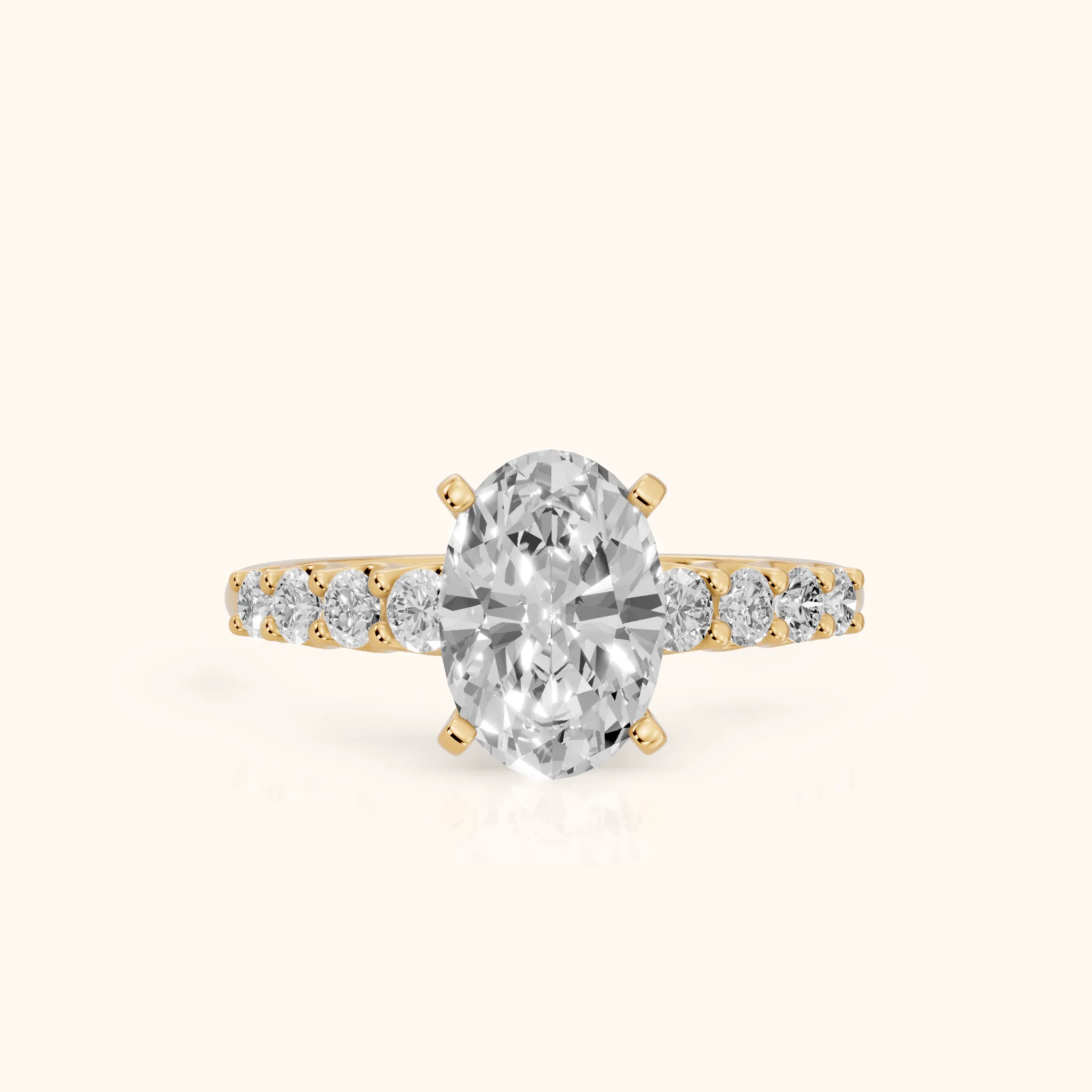 Augusta Graduated Pavé Oval Diamond Engagement Ring in Yellow Gold — view 1