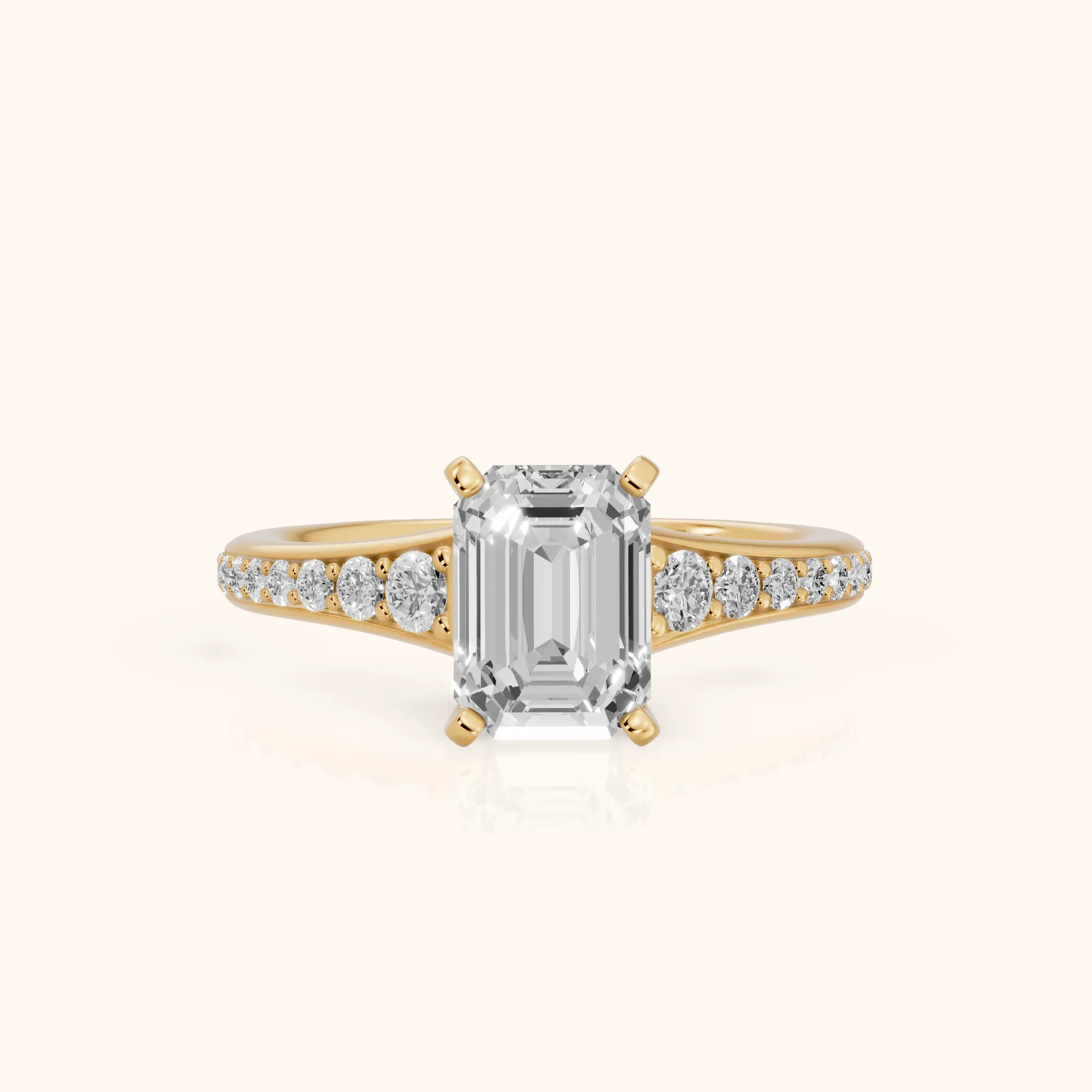 Calista Graduated Pavé Emerald Diamond Engagement Ring in Yellow Gold — view 1