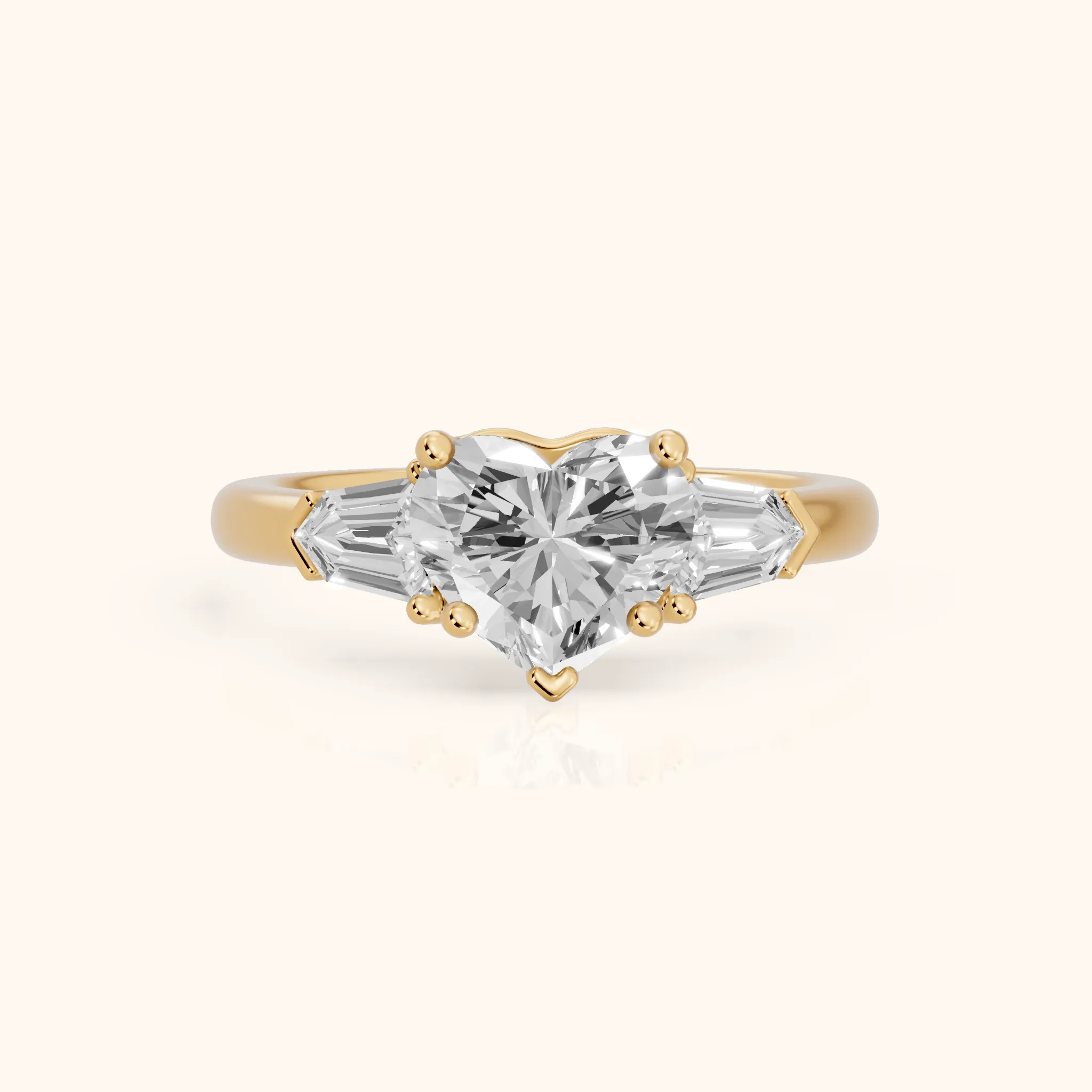 Dorothea Baguette Three-Stone Heart Diamond Engagement Ring in Yellow Gold — view 1