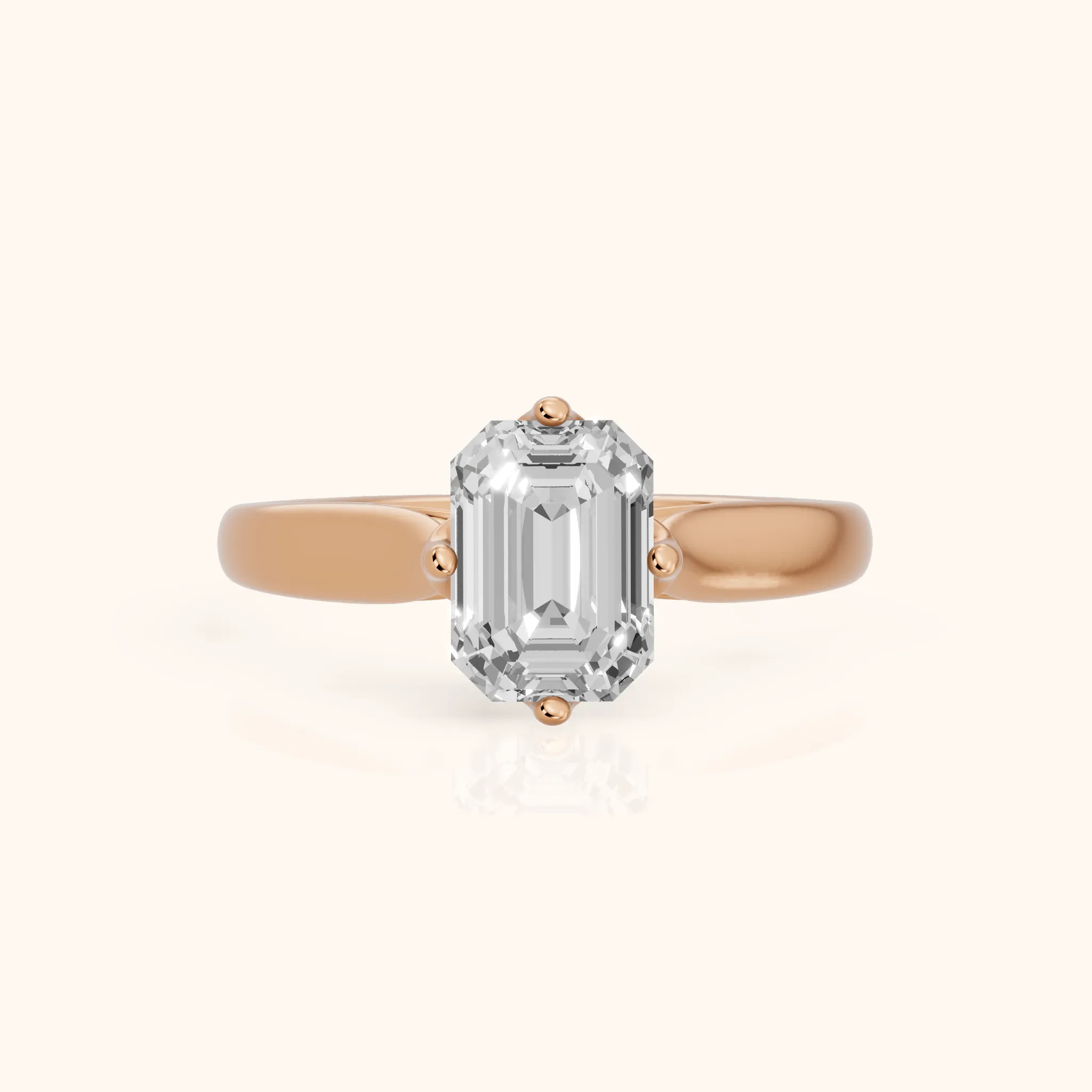 Edwina Crossover Solitaire Emerald Diamond Engagement Ring in Rose Gold — view 1