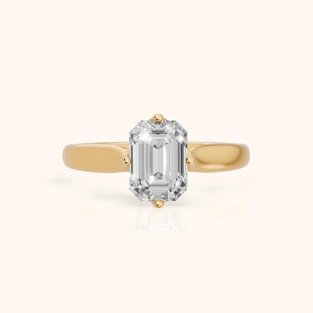 Edwina Crossover Solitaire Emerald Diamond Engagement Ring in Yellow Gold — view 2