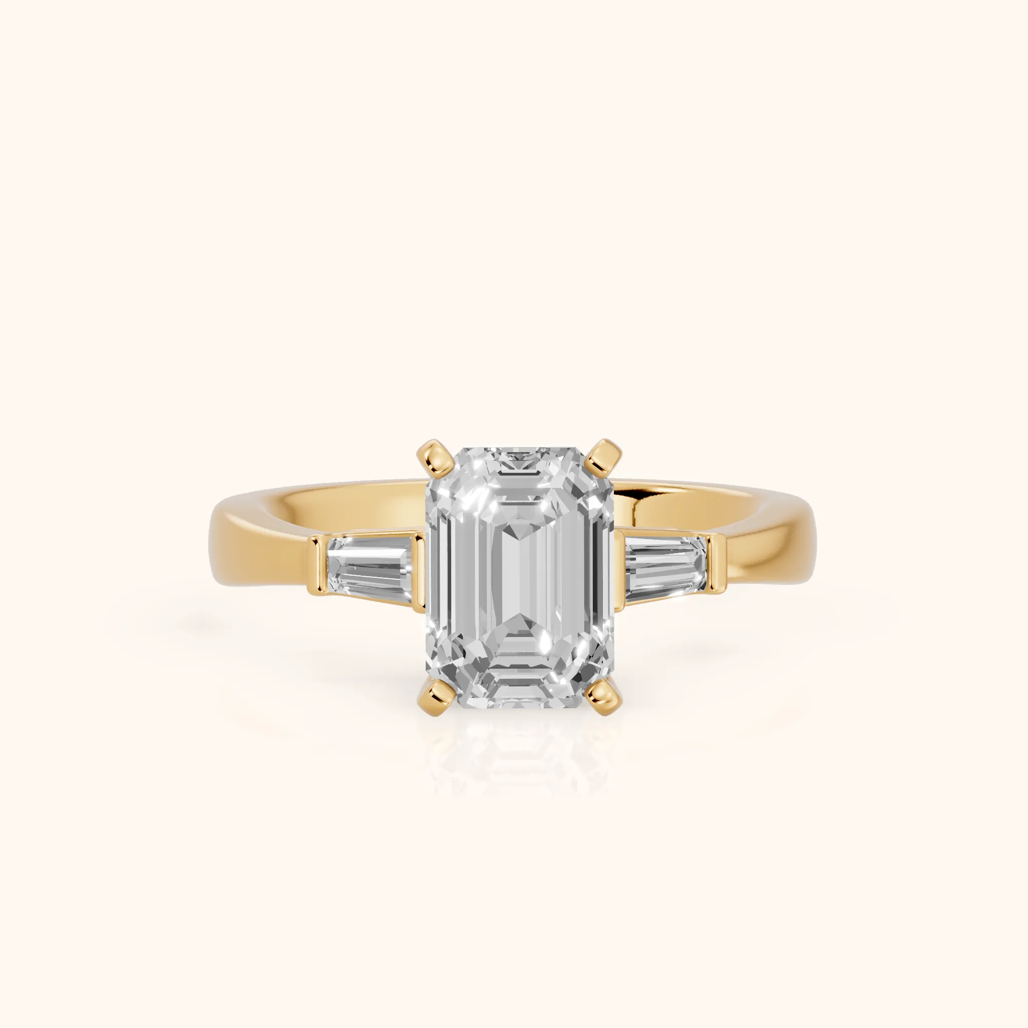 Jacinta Baguette Three-Stone Emerald Diamond Engagement Ring in Yellow Gold — view 1