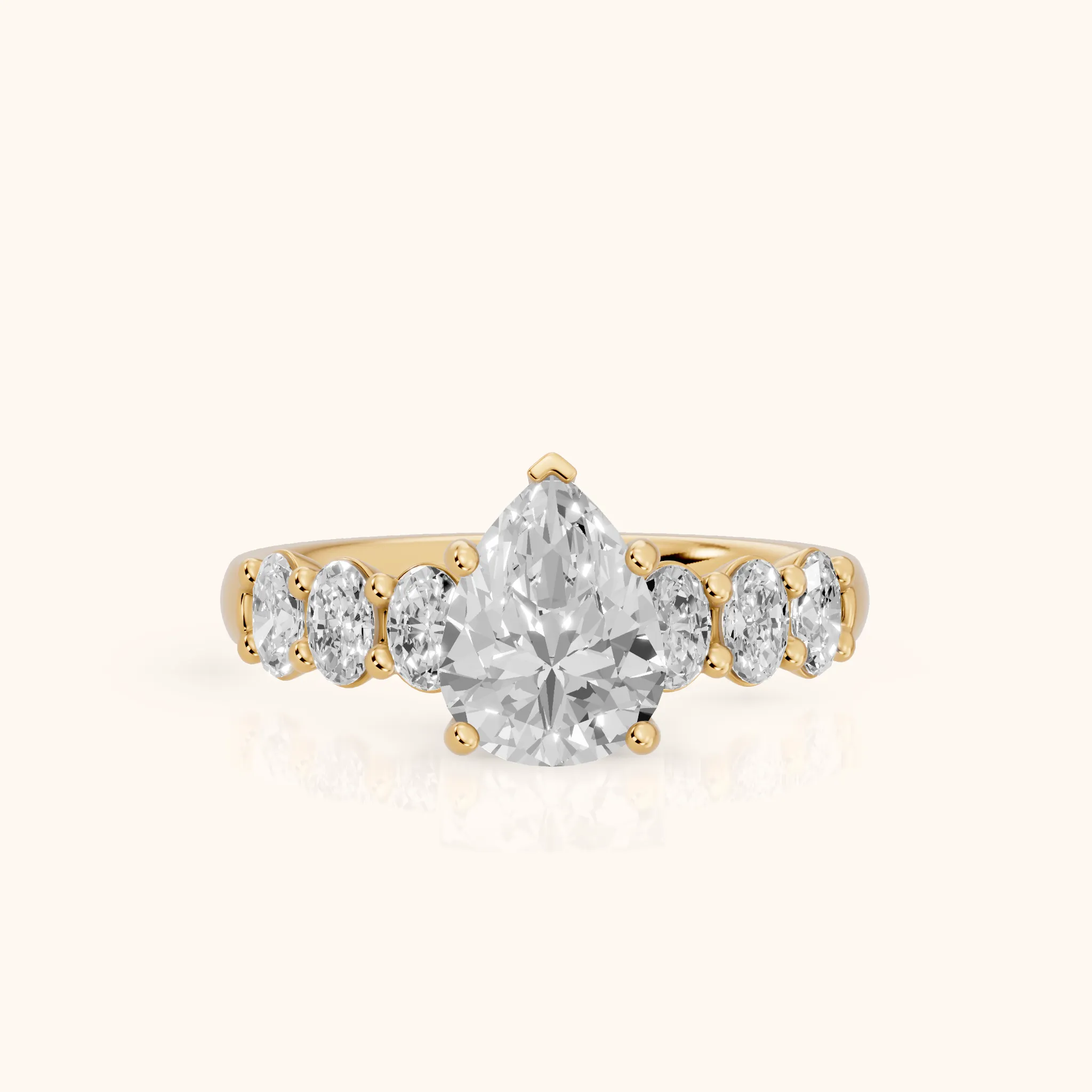Kiera Graduated Seven-Stone Pear Diamond Engagement Ring in Yellow Gold — view 1