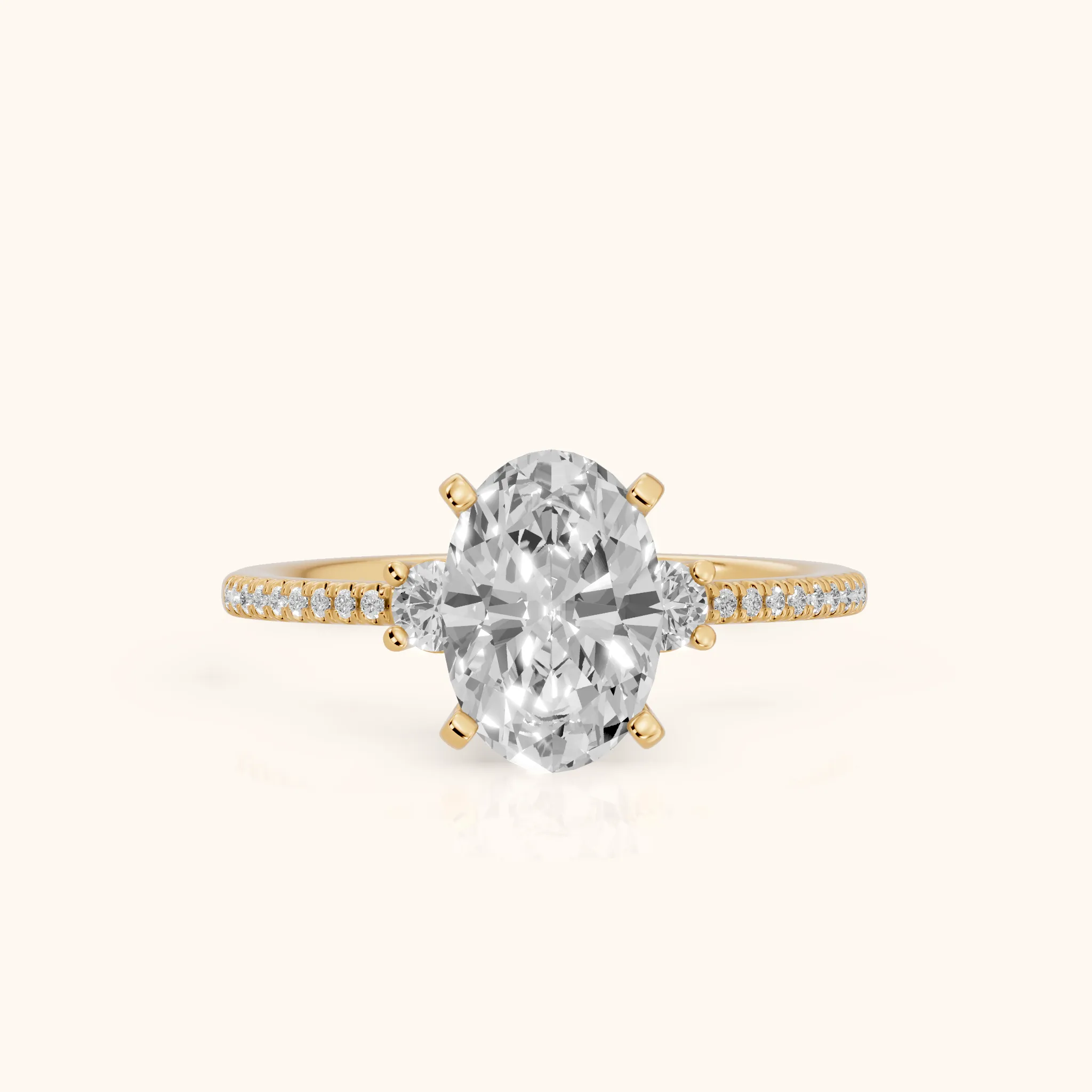 Nerissa Three-Stone Micropavé Oval Diamond Engagement Ring in Yellow Gold — view 1