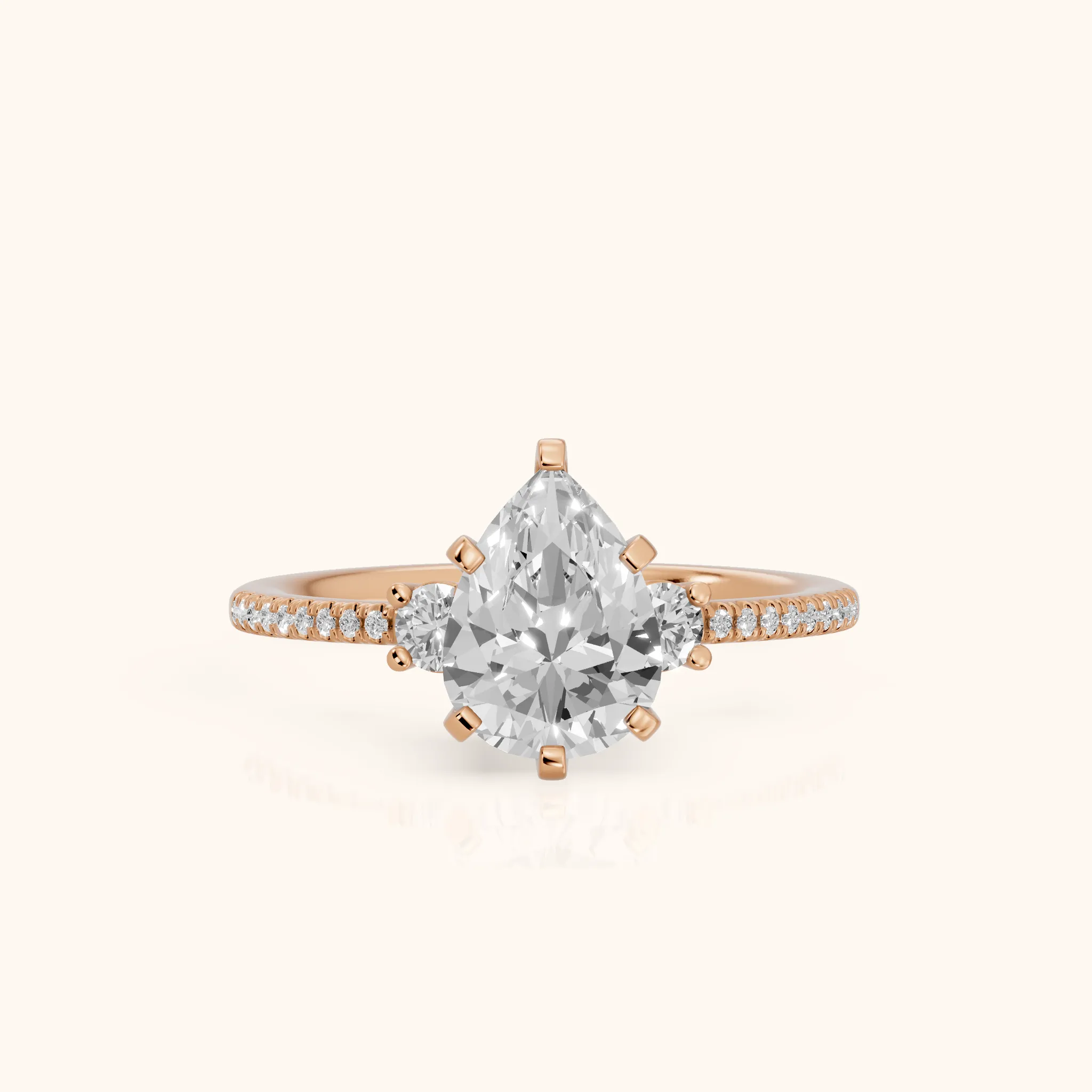 Nerissa Three-Stone Micropavé Pear Diamond Engagement Ring in Rose Gold — view 1