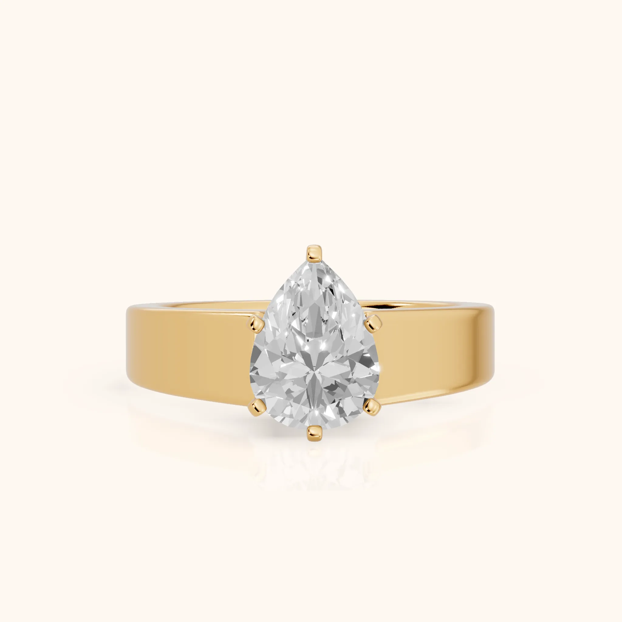 Susannah Wide Band Solitaire Pear Diamond Engagement Ring in Yellow Gold — view 1