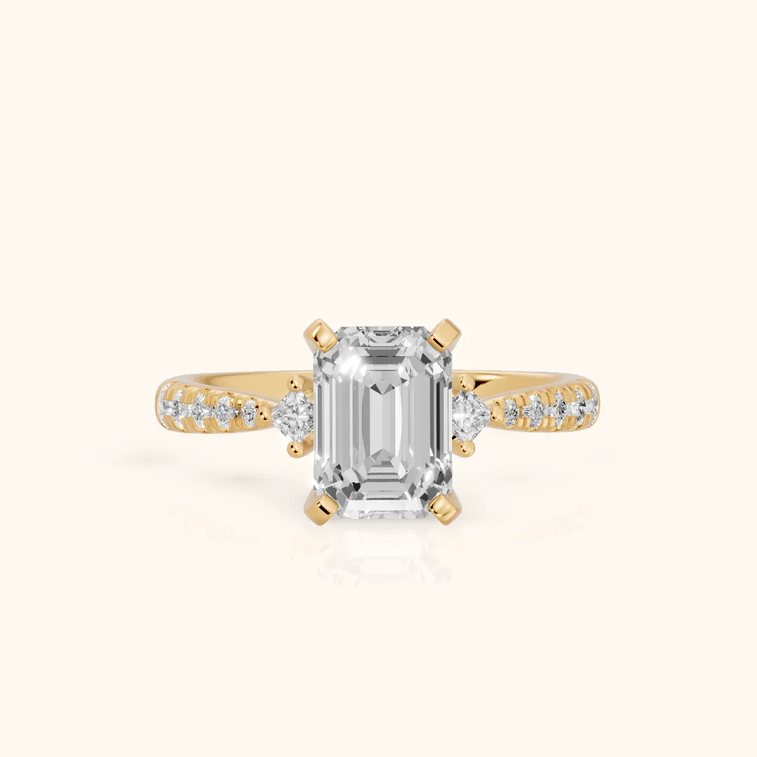 Alethea Three-Stone Pavé Emerald Diamond Engagement Ring in Yellow Gold — view 2