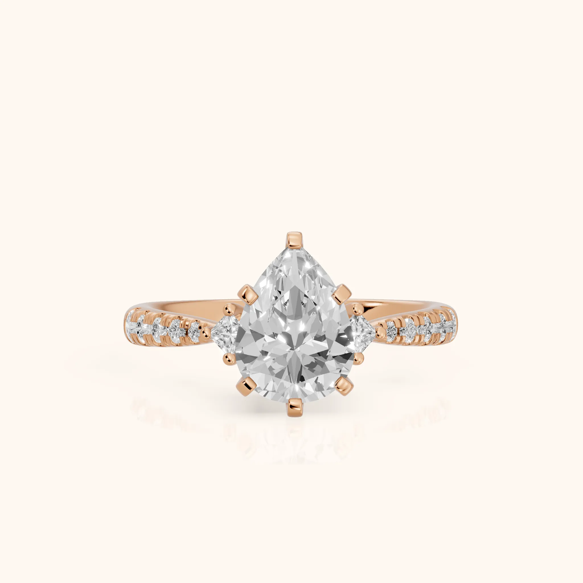 Alethea Three-Stone Pavé Pear Diamond Engagement Ring in Rose Gold — view 1