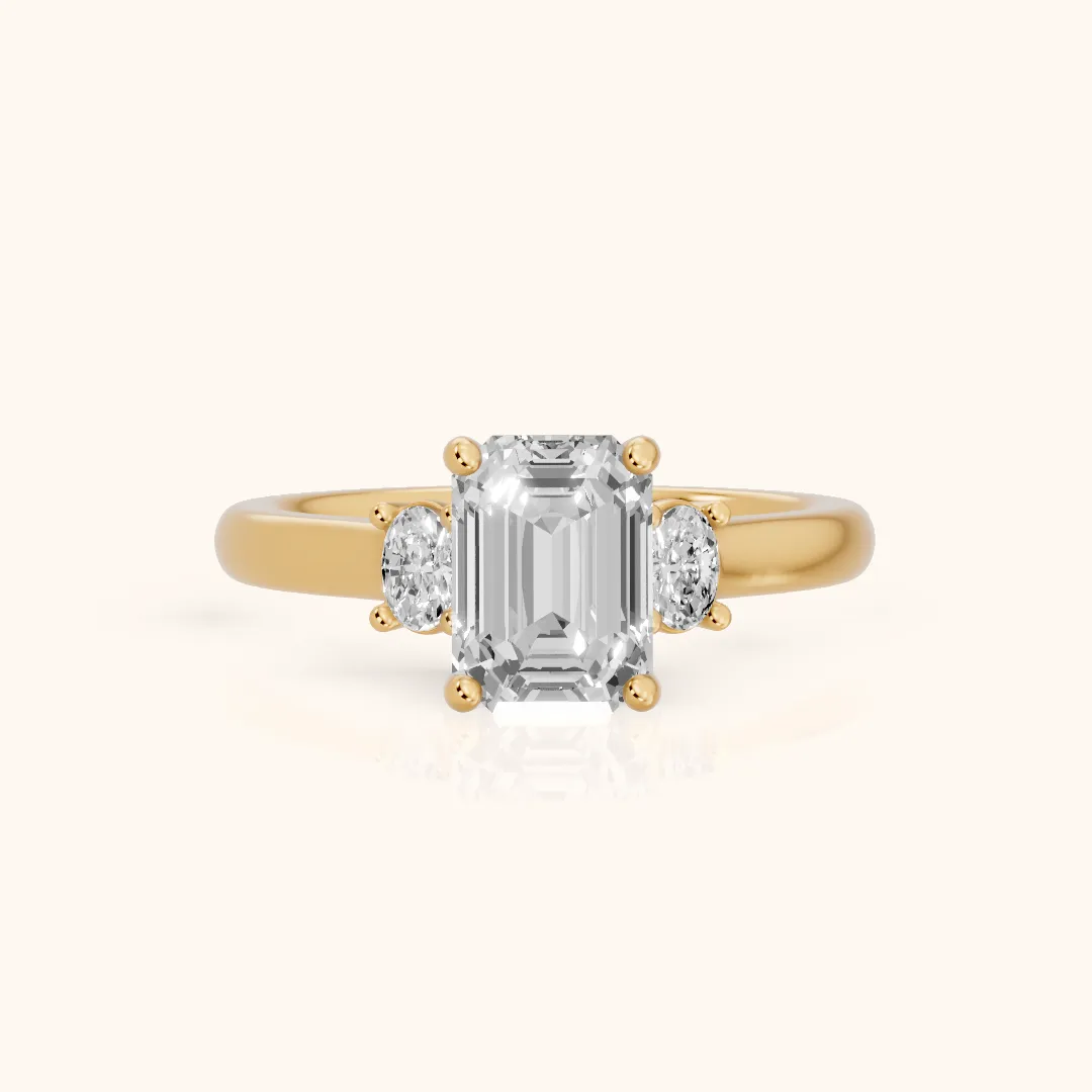 Alya Three-Stone Cathedral Emerald Diamond Engagement Ring in Yellow Gold — view 2