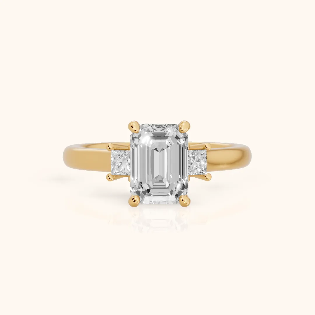 Brenna Three-Stone Emerald Diamond Engagement Ring in Yellow Gold — view 2