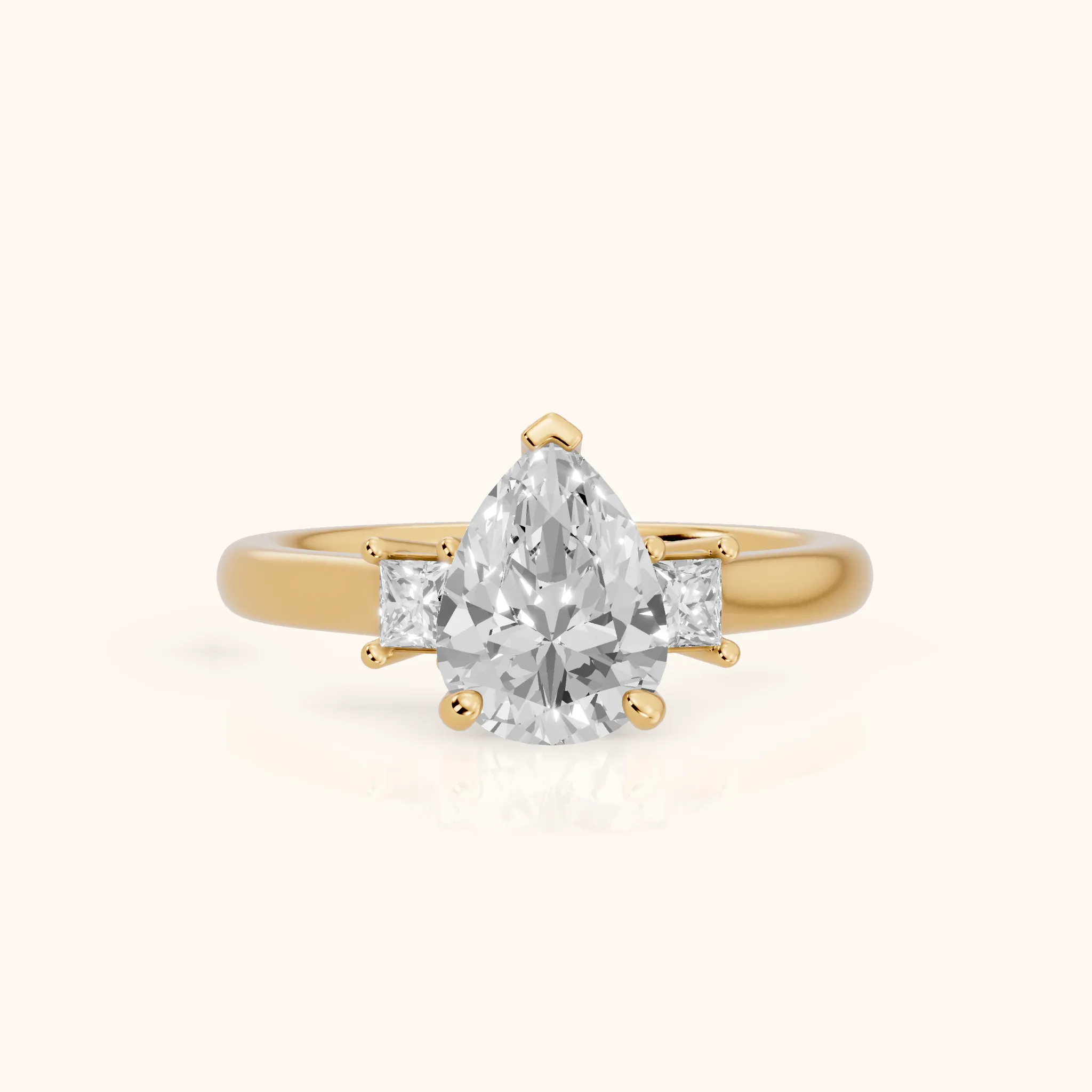 Brenna Three-Stone Pear Diamond Engagement Ring in Yellow Gold — view 1