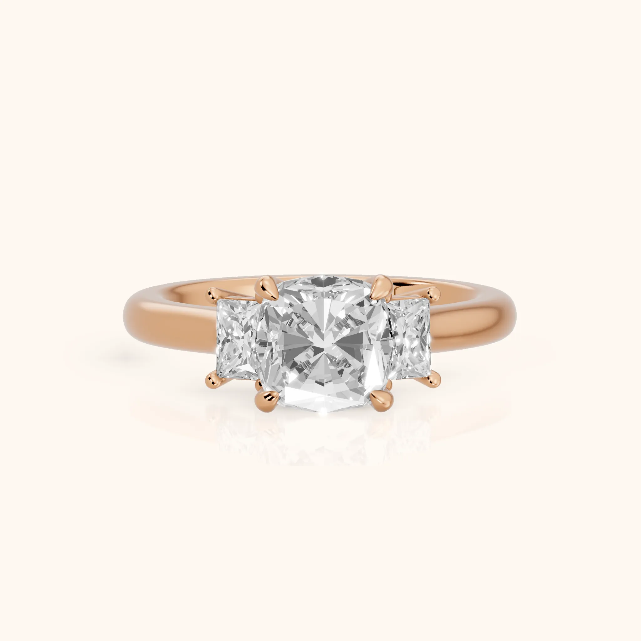 Cosette Statement Three-Stone Cushion Diamond Engagement Ring in Rose Gold — view 1