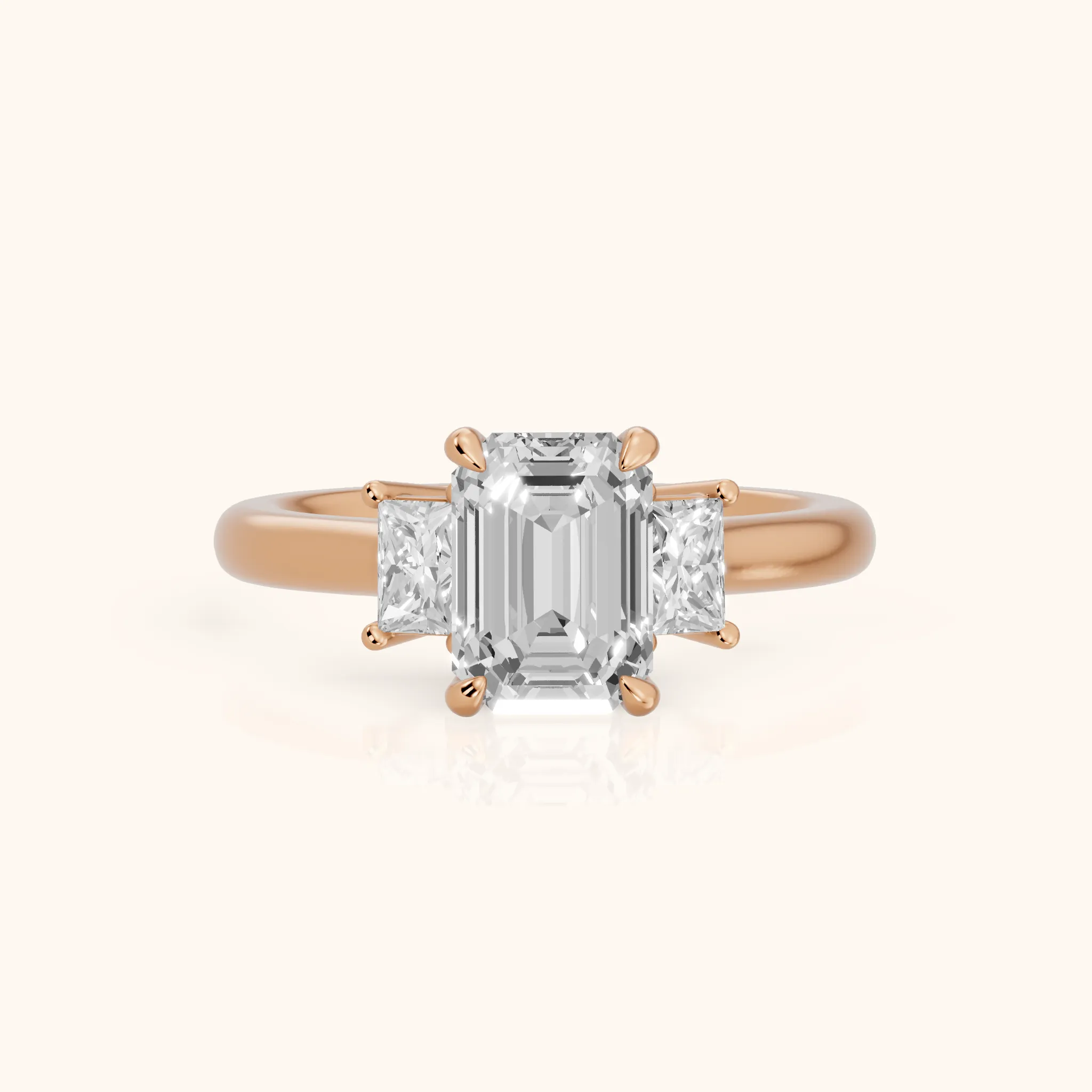 Cosette Statement Three-Stone Emerald Diamond Engagement Ring in Rose Gold — view 1