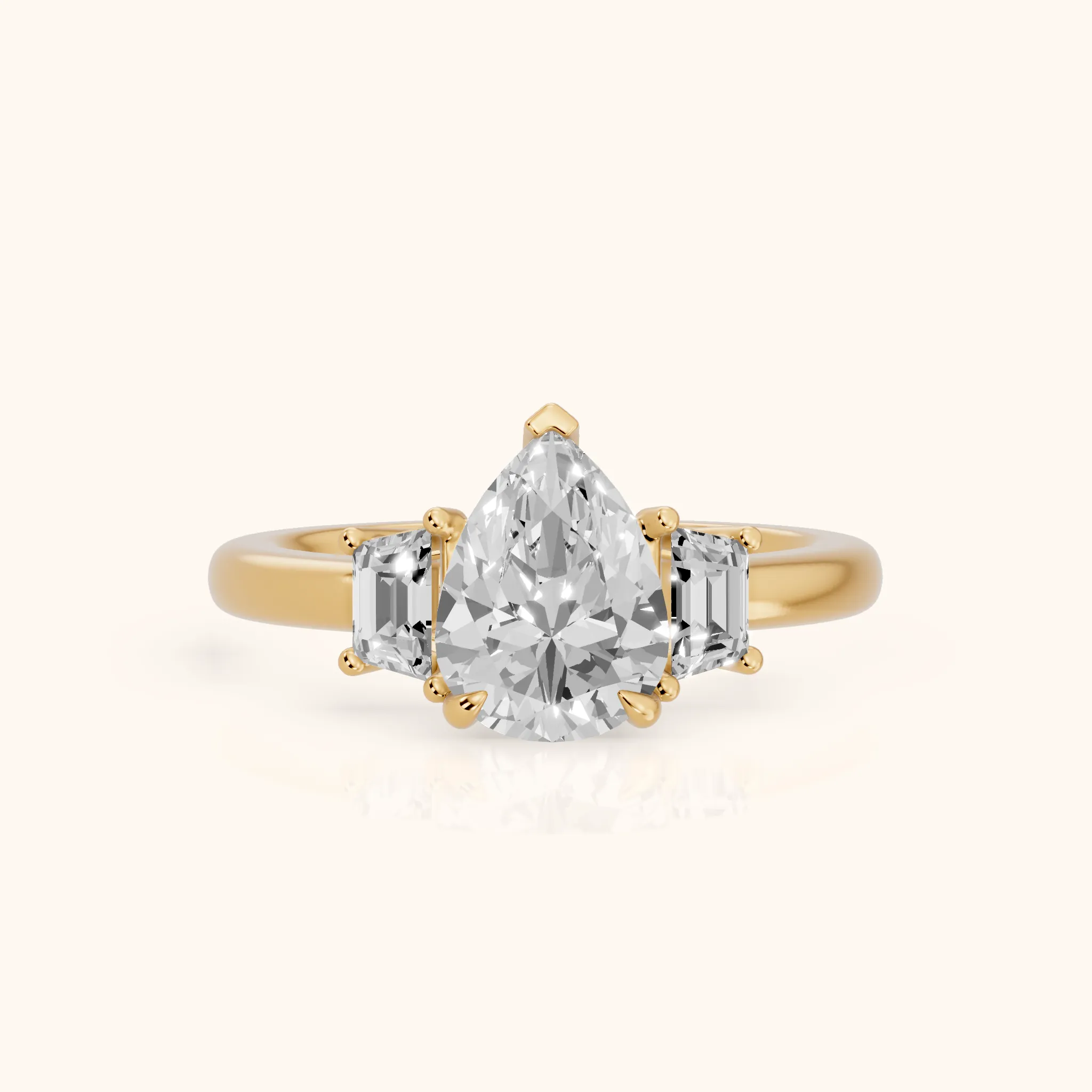 Federica Trapezoid Three-Stone Pear Diamond Engagement Ring in Yellow Gold — view 1